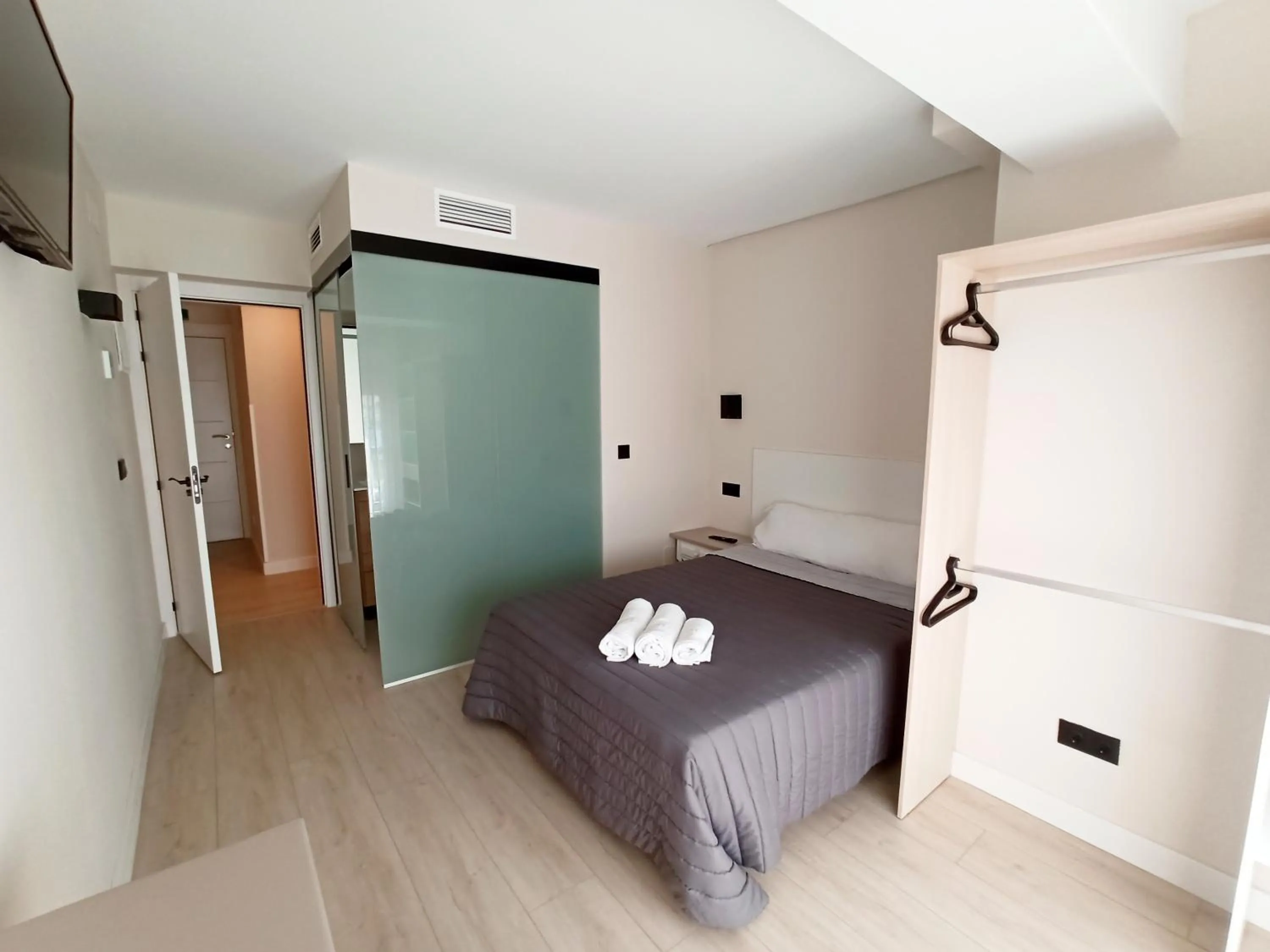 Bed in Bahia Rooms Cantabria 3000