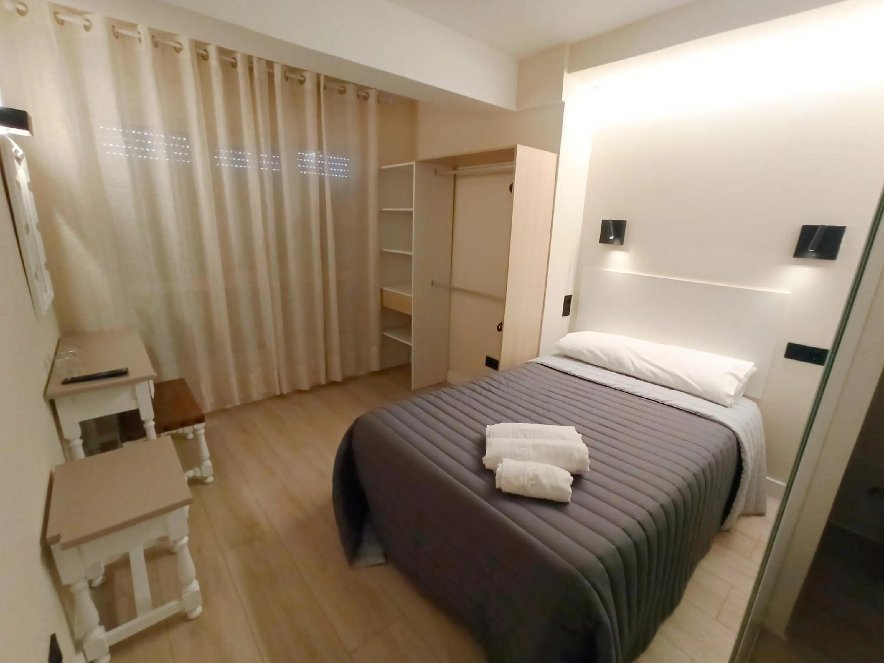 Bed in Bahia Rooms Cantabria 3000