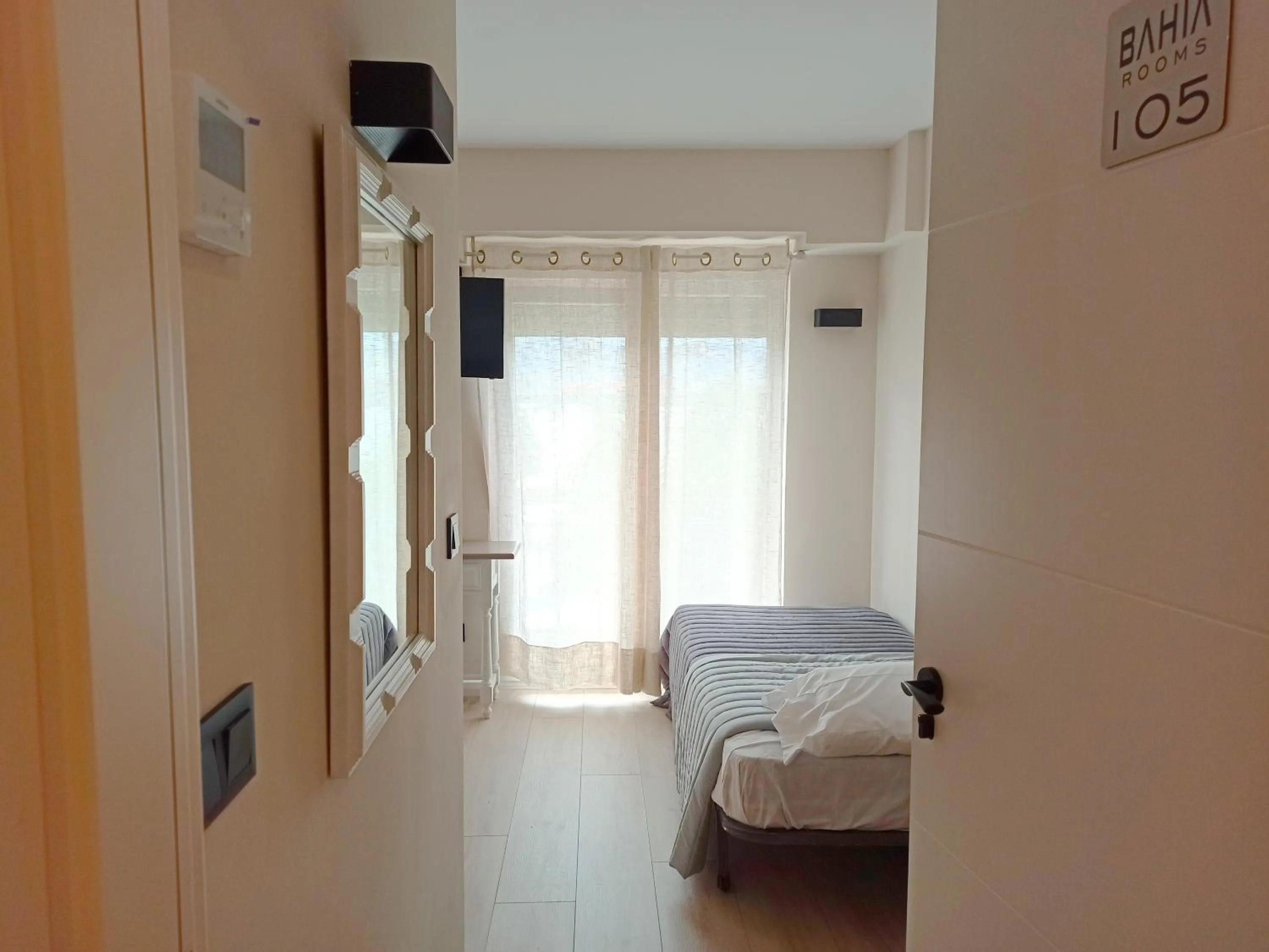 Bed in Bahia Rooms Cantabria 3000