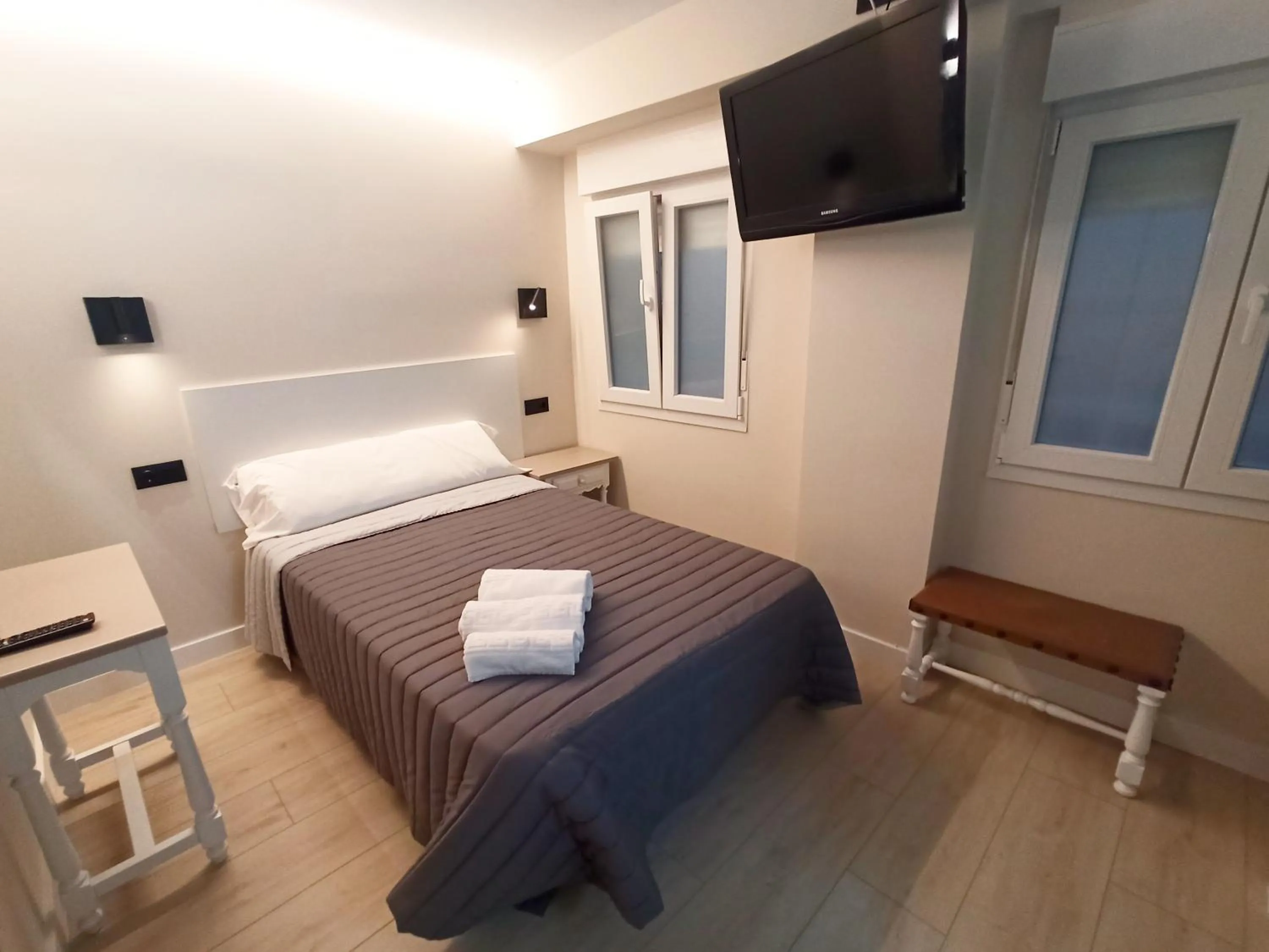 Bed in Bahia Rooms Cantabria 3000