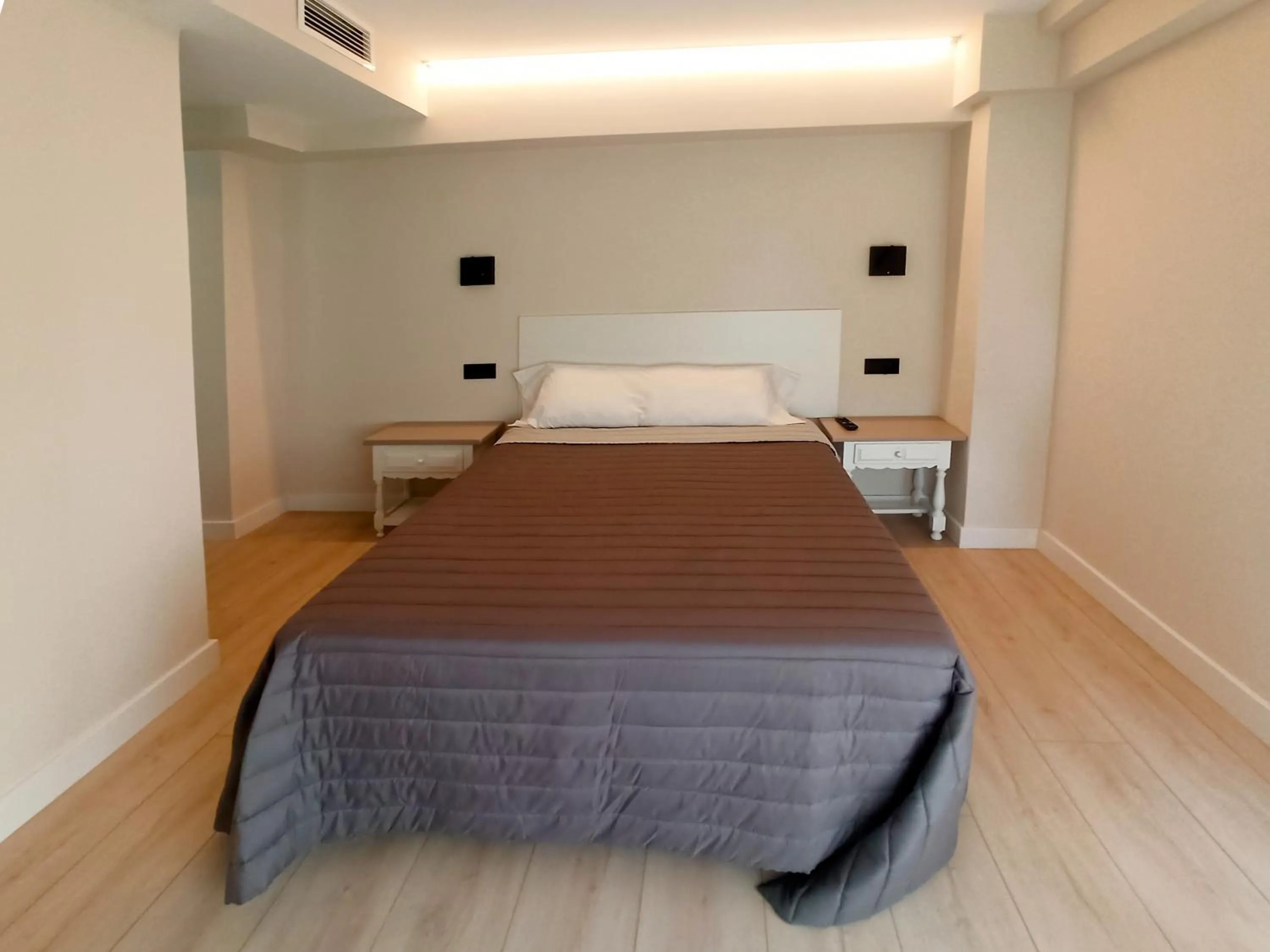 Bed in Bahia Rooms Cantabria 3000