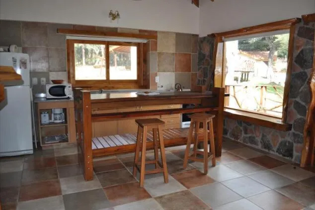 Kitchen or kitchenette in Cabañas Aufenthalt