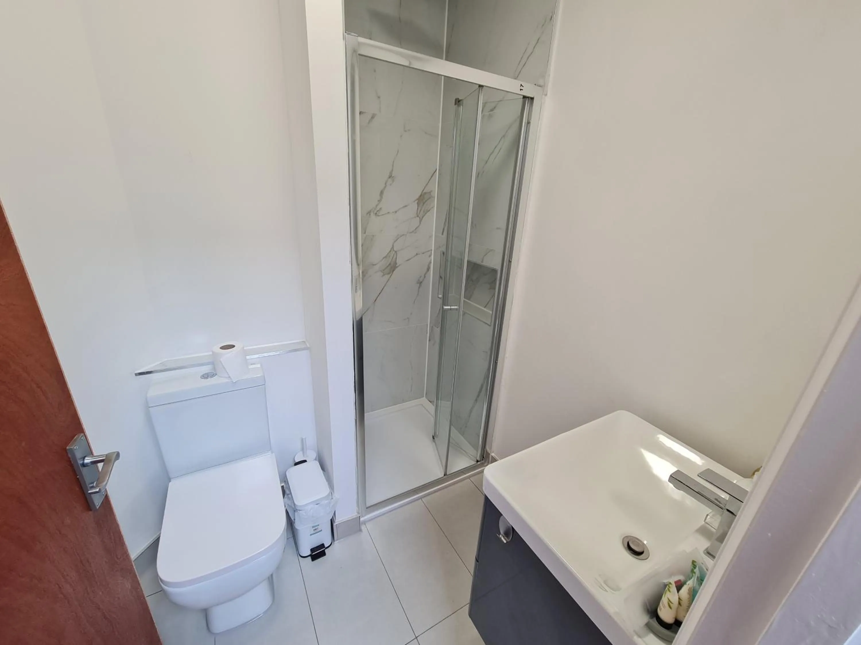 Shower in Stylish Suites with kitchenette