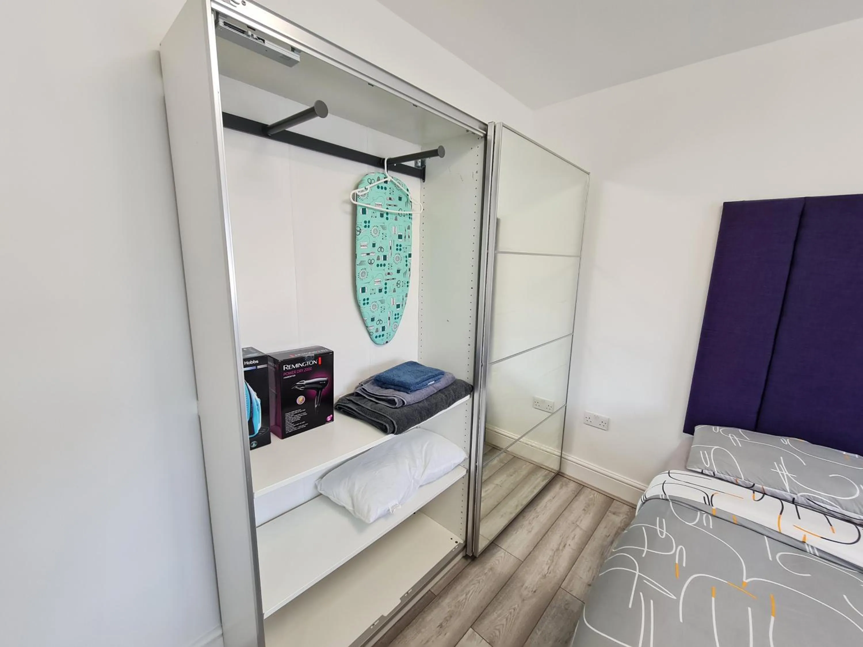 Bedroom in Stylish Suites with kitchenette