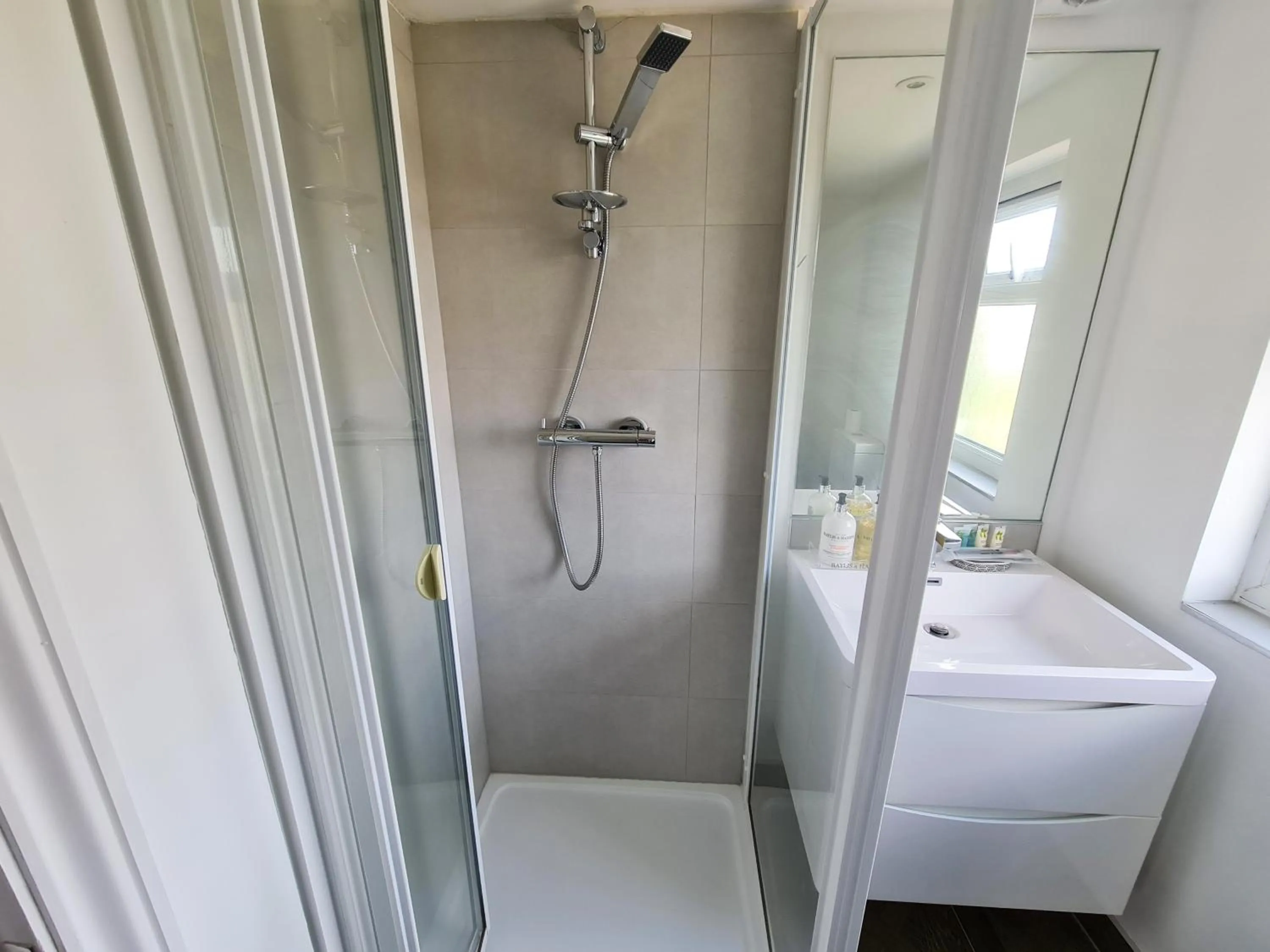 Shower in Stylish Suites with kitchenette