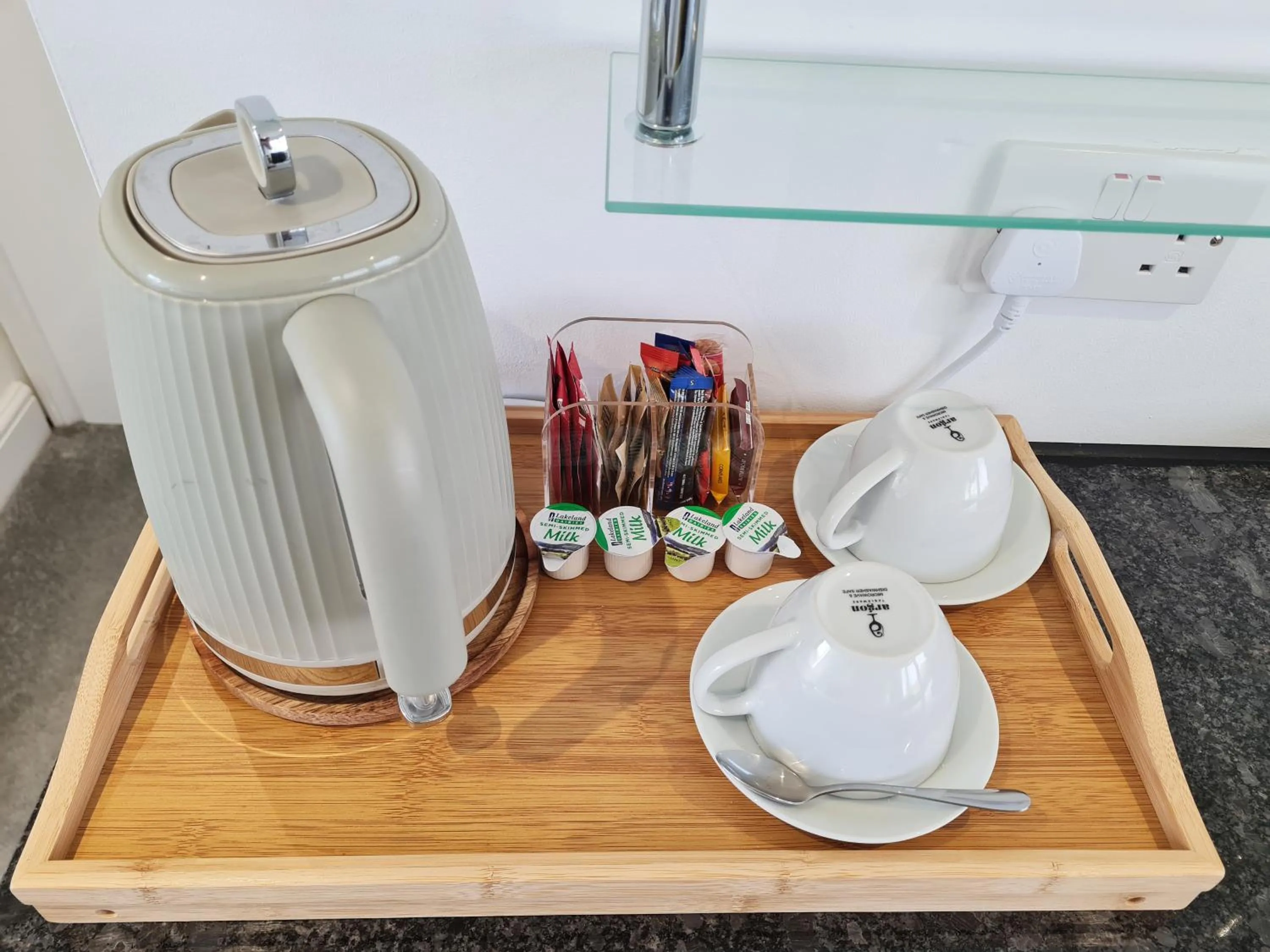 Kitchen or kitchenette in Stylish Suites with kitchenette