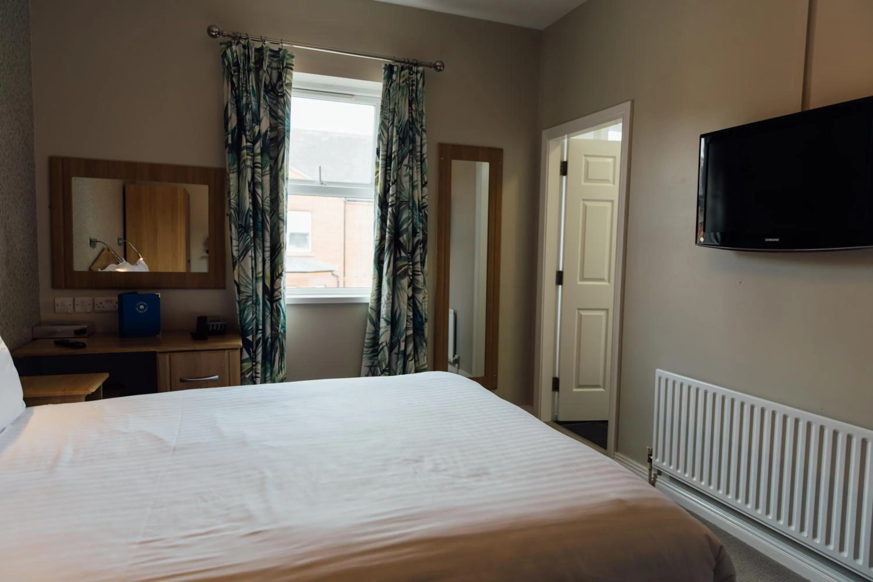 Bed in The Malone Hotel