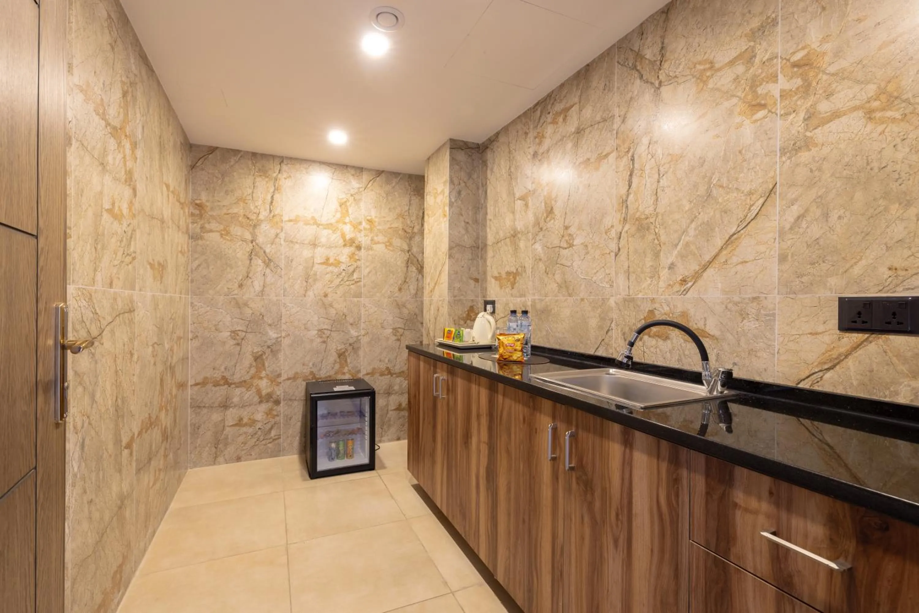 Kitchen or kitchenette in Jeddah Homes Boutique Hotel