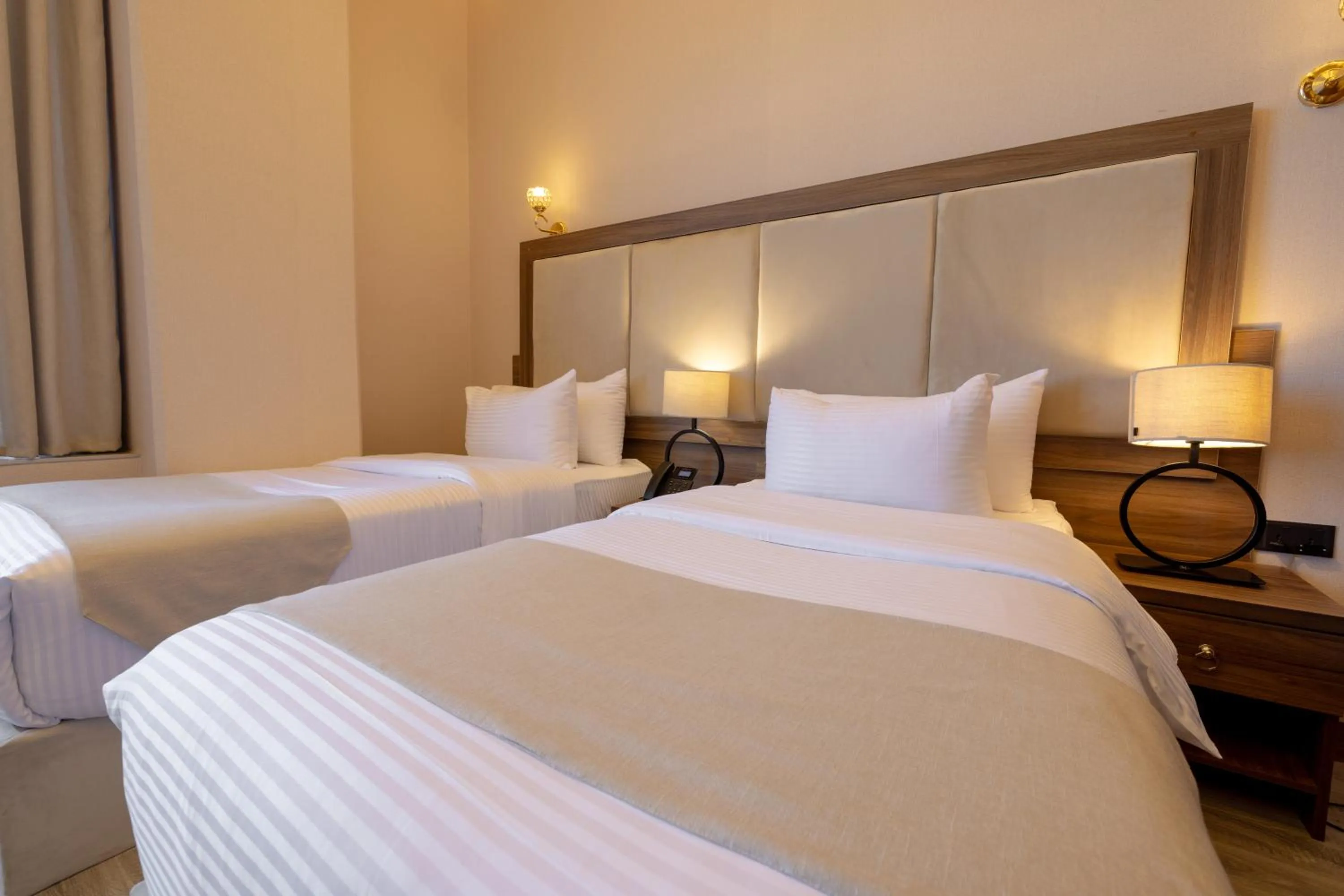 Bed in Jeddah Homes Boutique Hotel