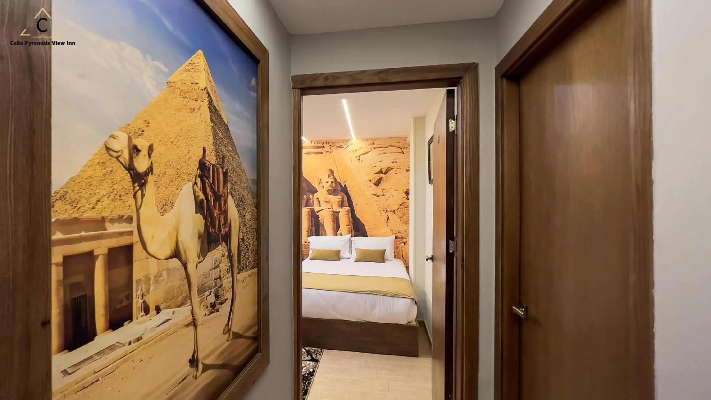 Bed in Celia Pyramids View inn