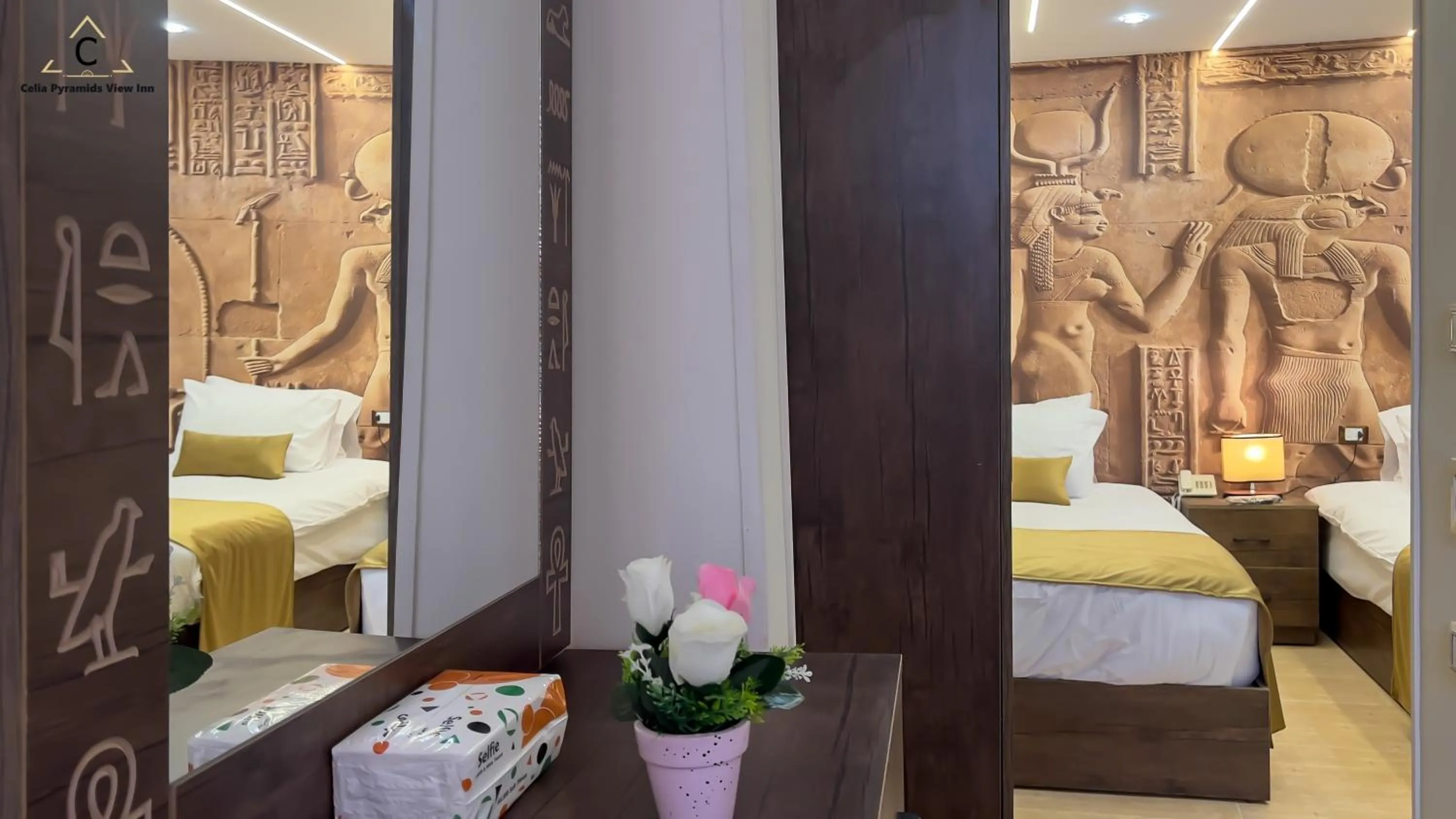 Bed in Celia Pyramids View inn