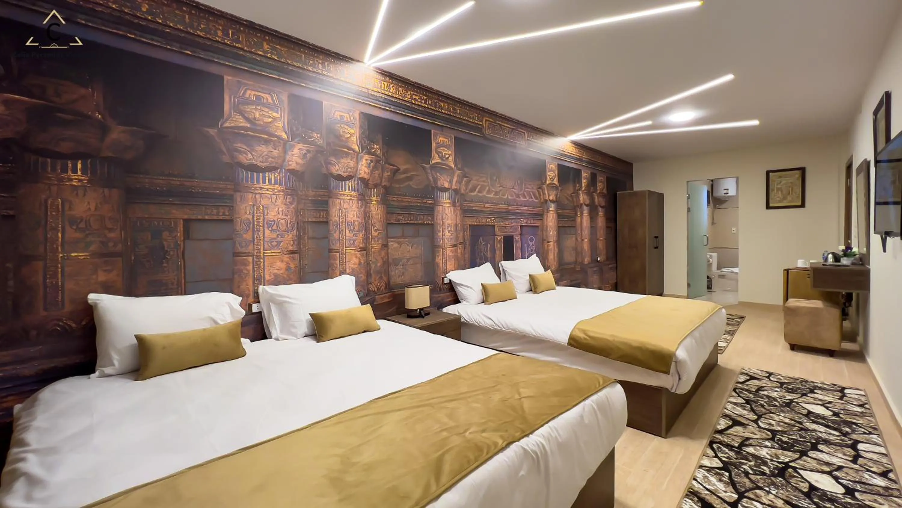 Bed in Celia Pyramids View inn