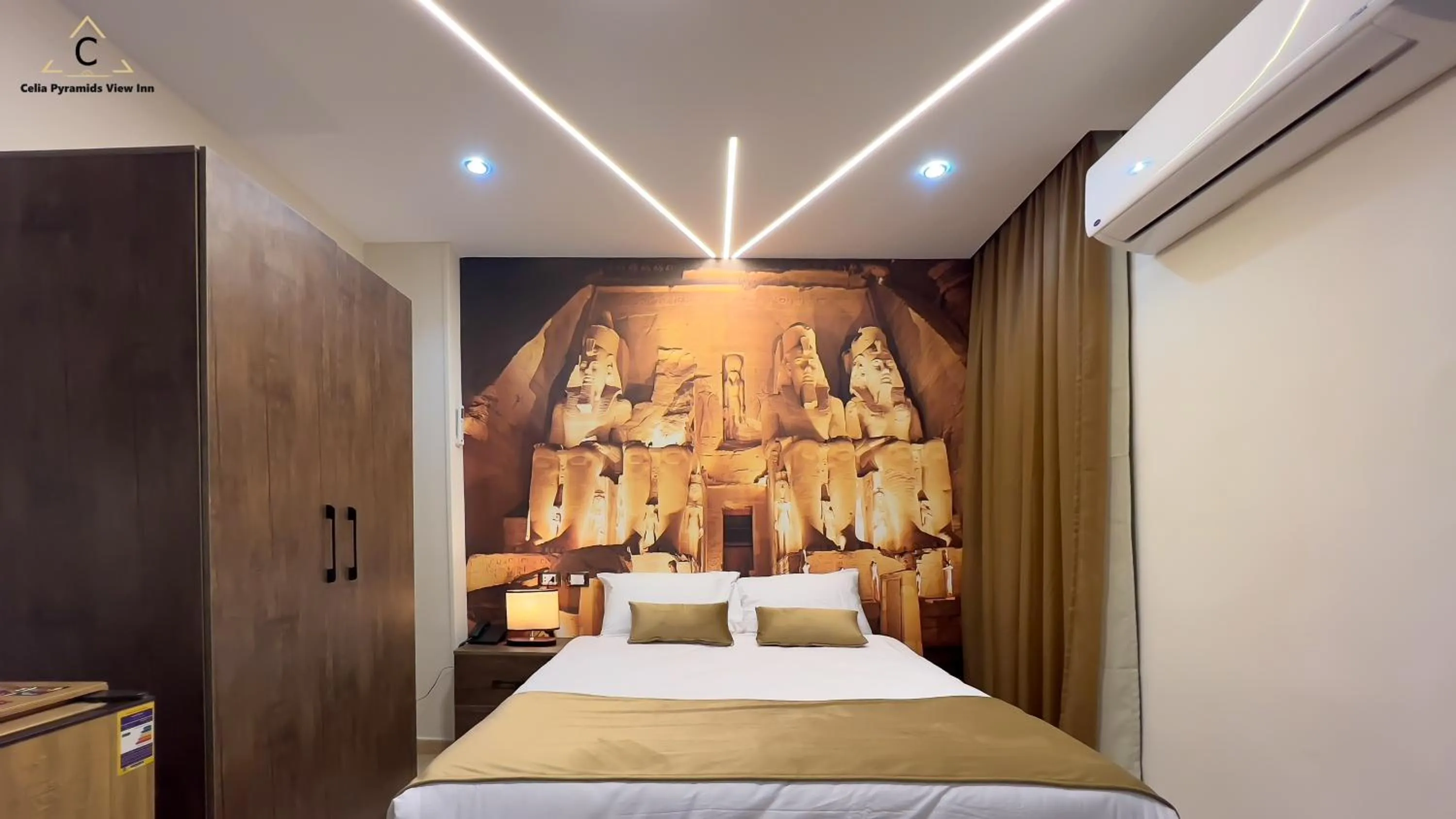 Bed in Celia Pyramids View inn