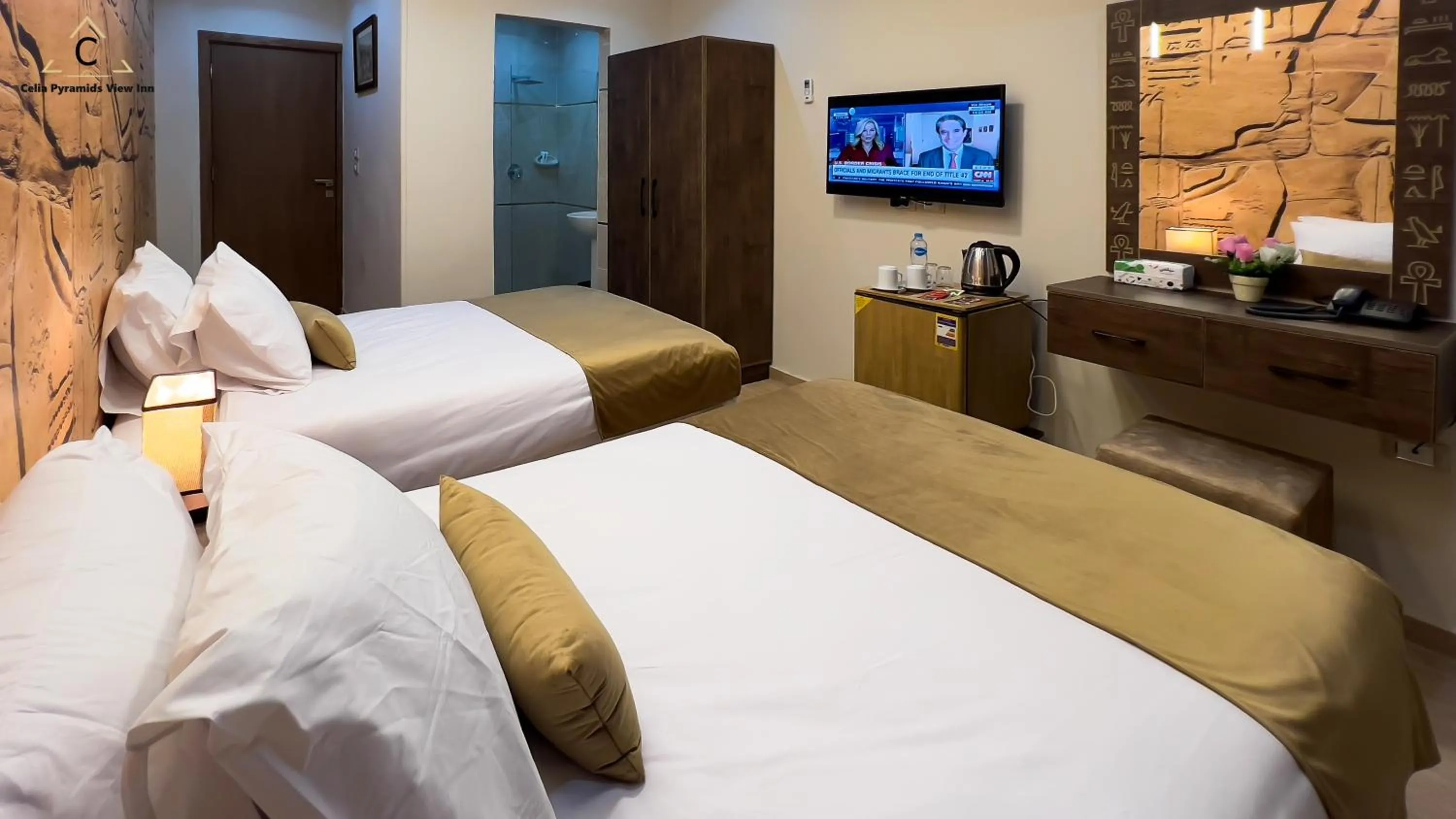 Bed in Celia Pyramids View inn