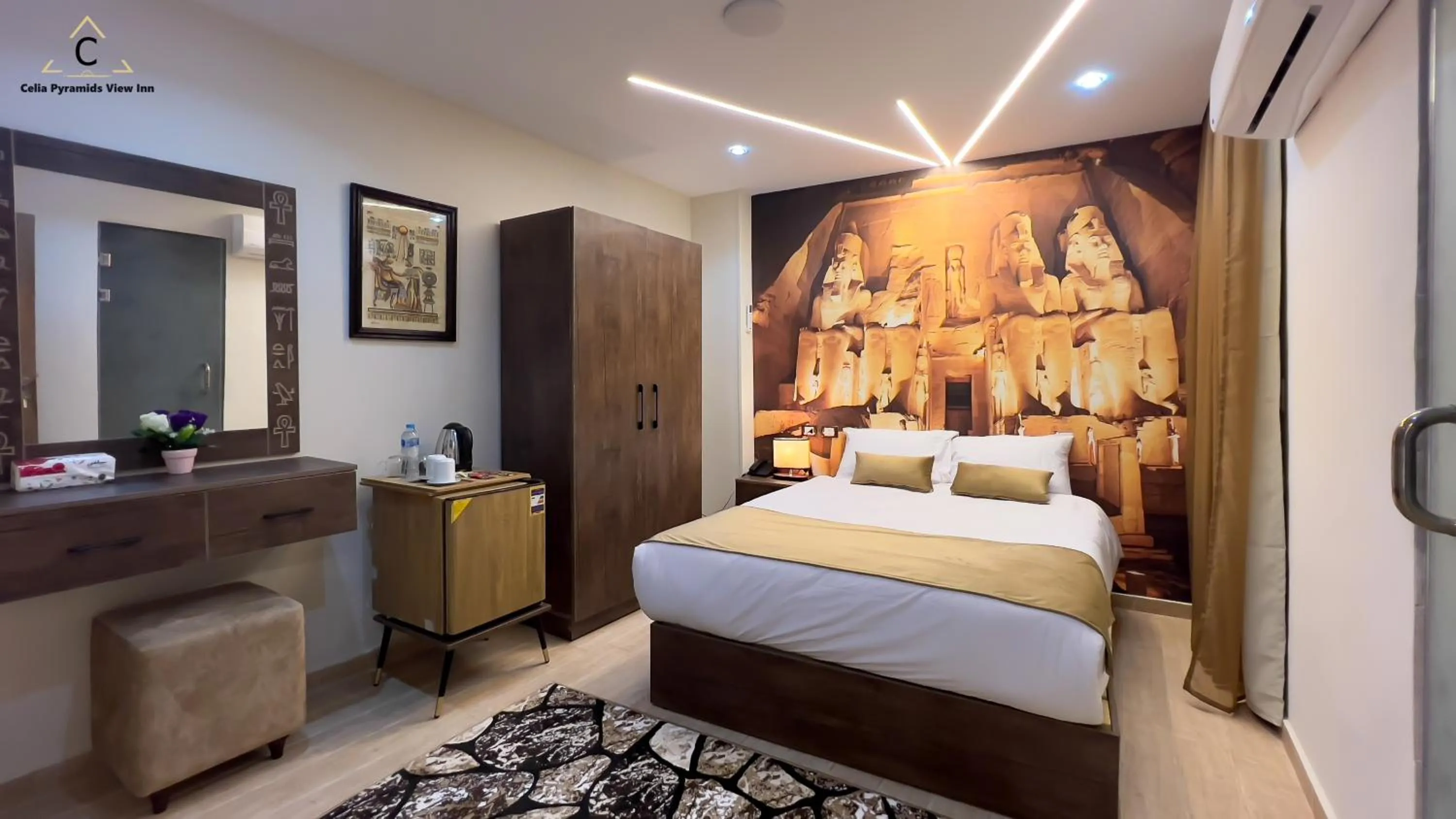 Bed in Celia Pyramids View inn