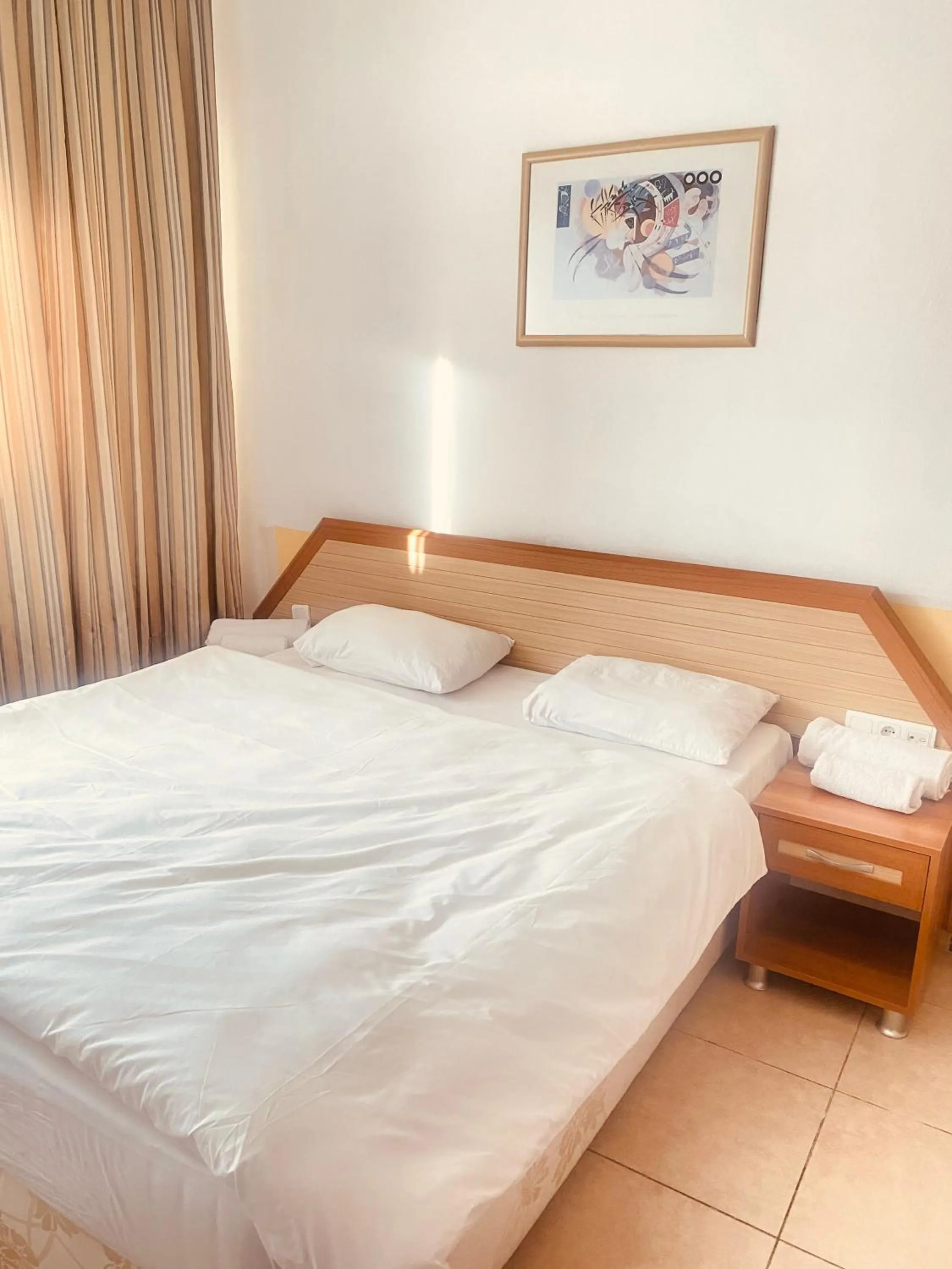 Bed in Agora Apart Hotel