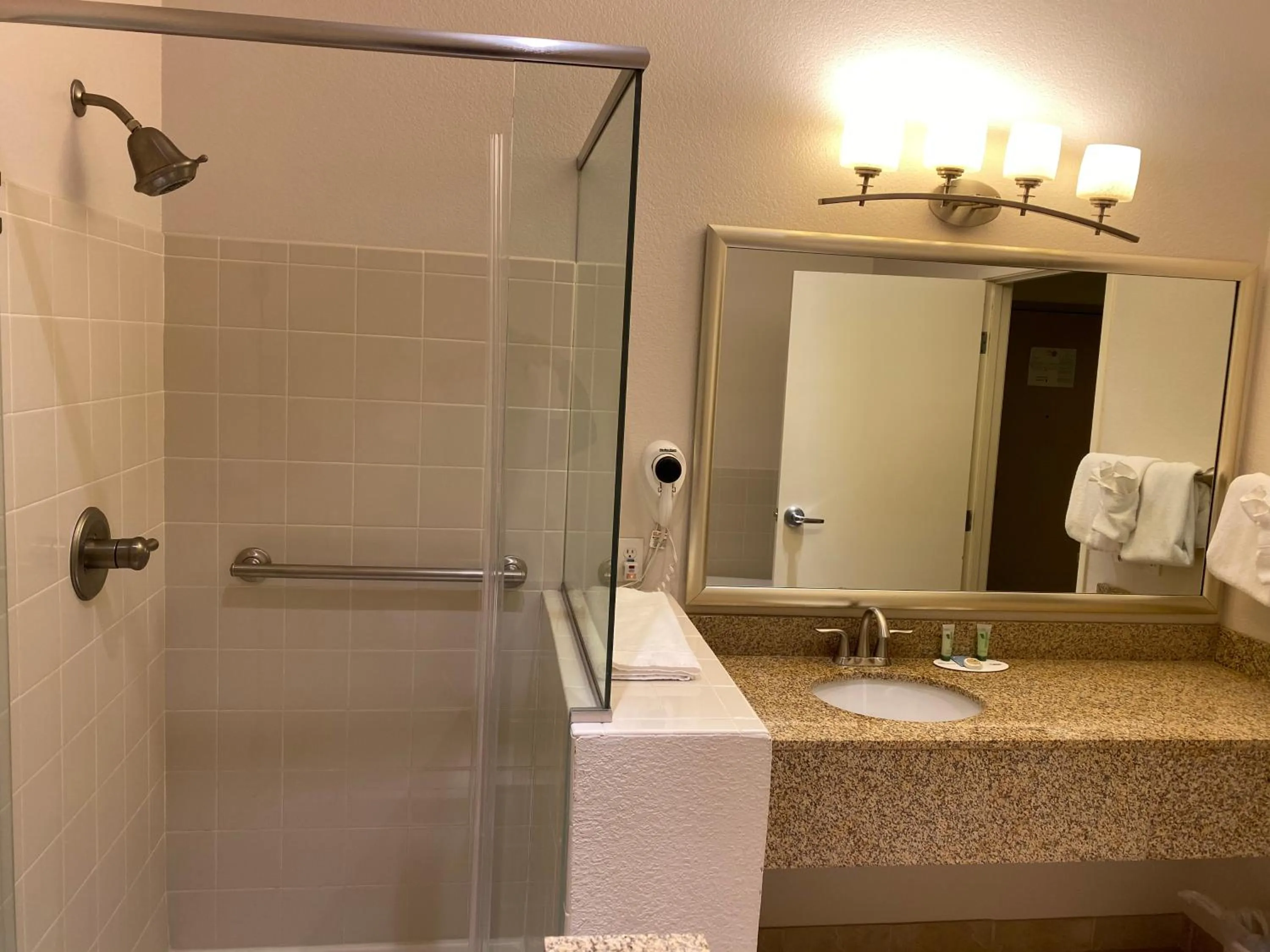 Shower in A Riverside Inn Travelodge by Wyndham