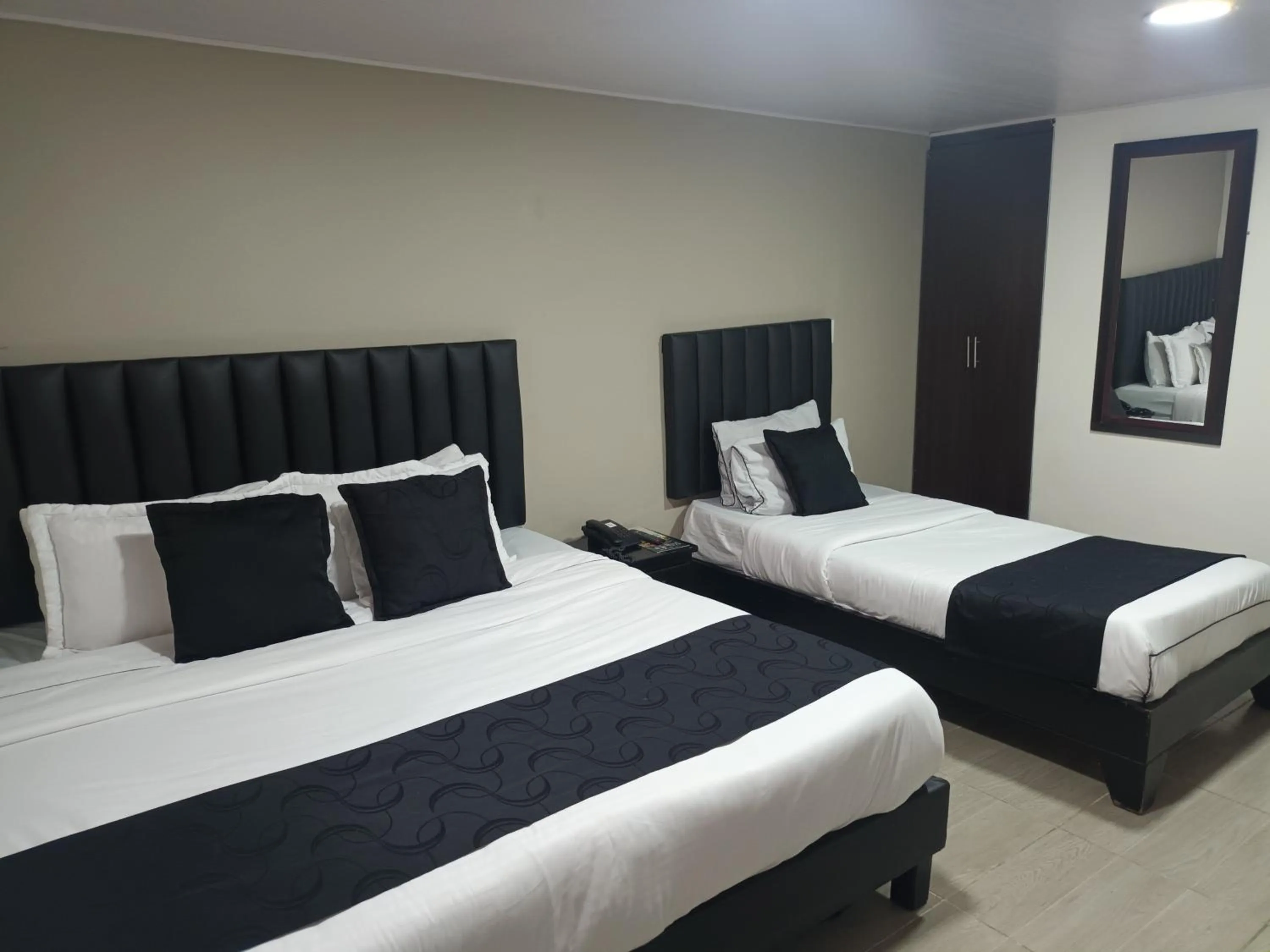 Bed in Hotel Santiago Plaza