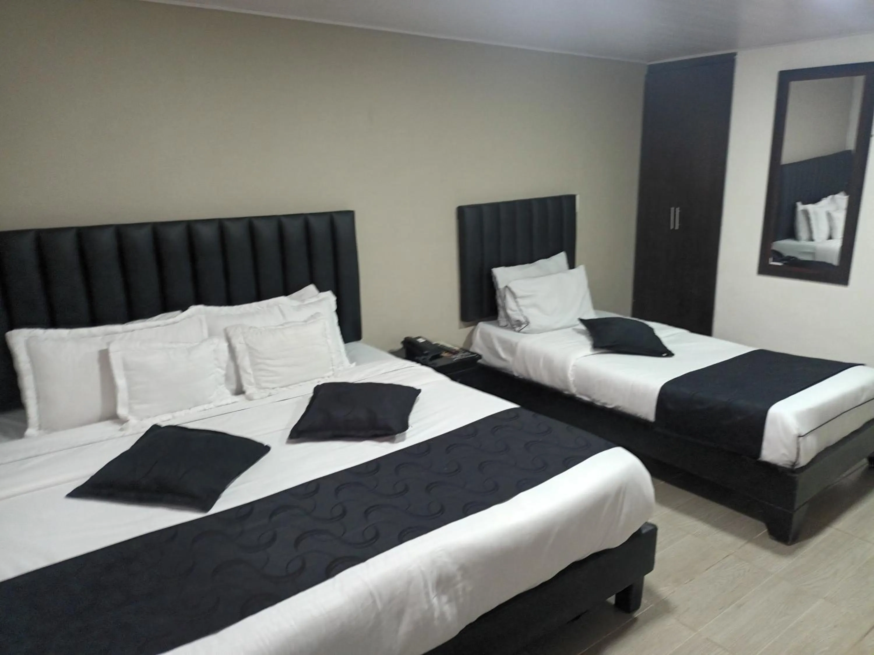 Bed in Hotel Santiago Plaza