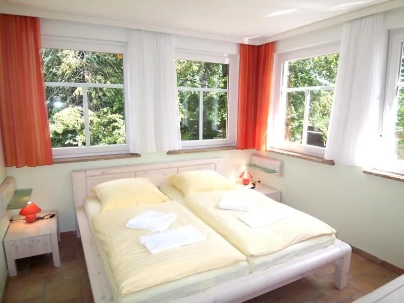 Bedroom, Bed in Villa Seefisch
