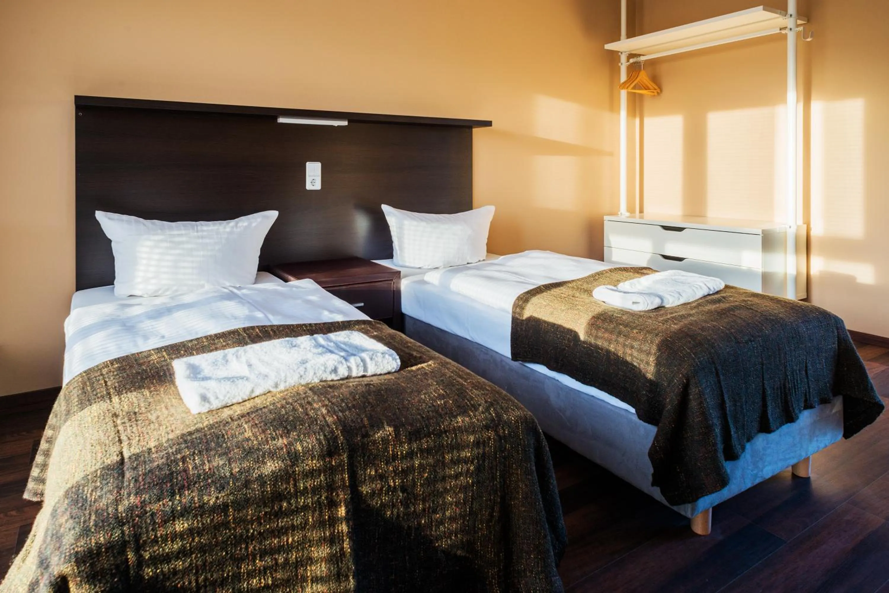 Bed in Apple City Hotel