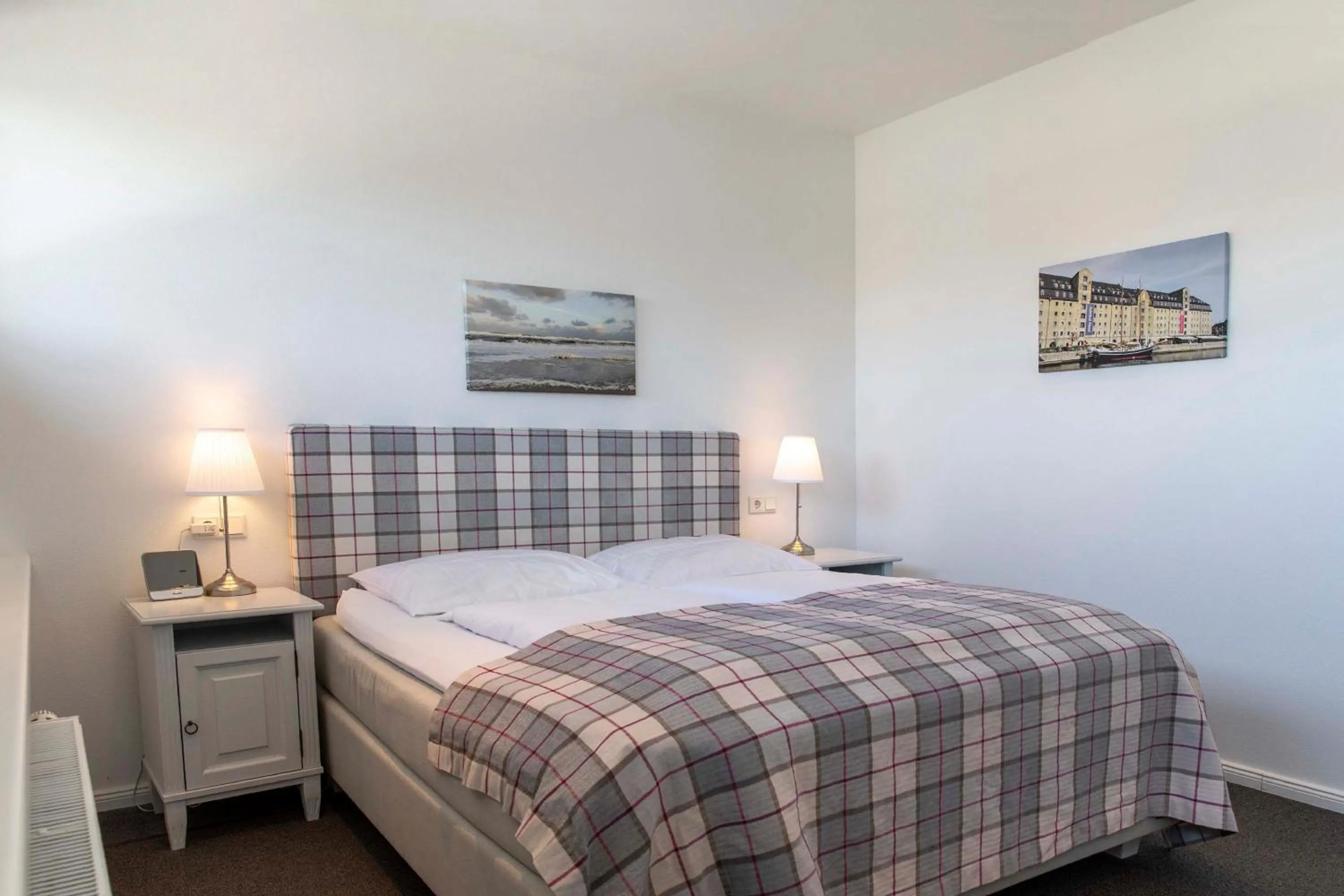 Bed in Luxx City Apartments