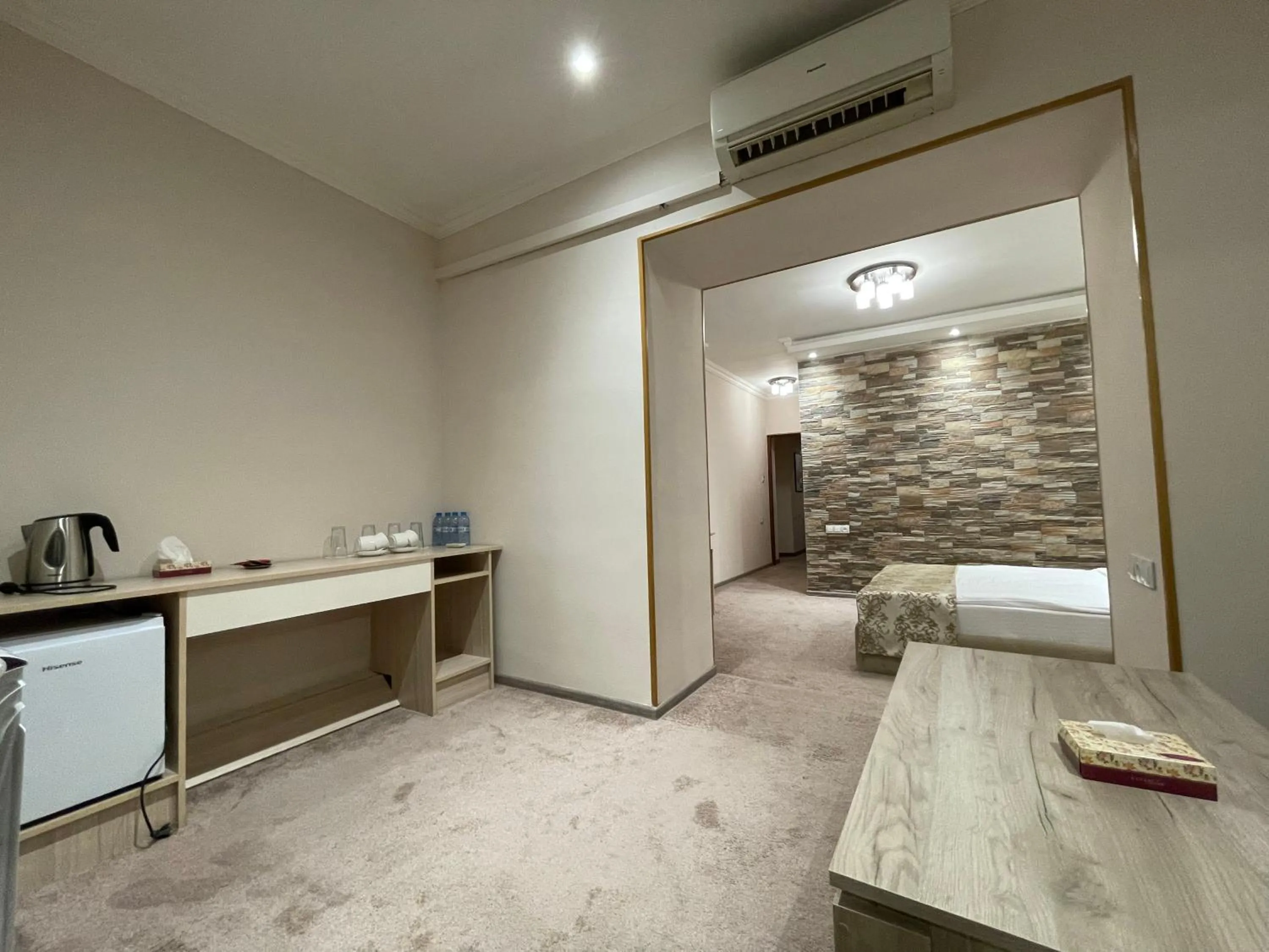 Bed in DeLin Hotel And Tours