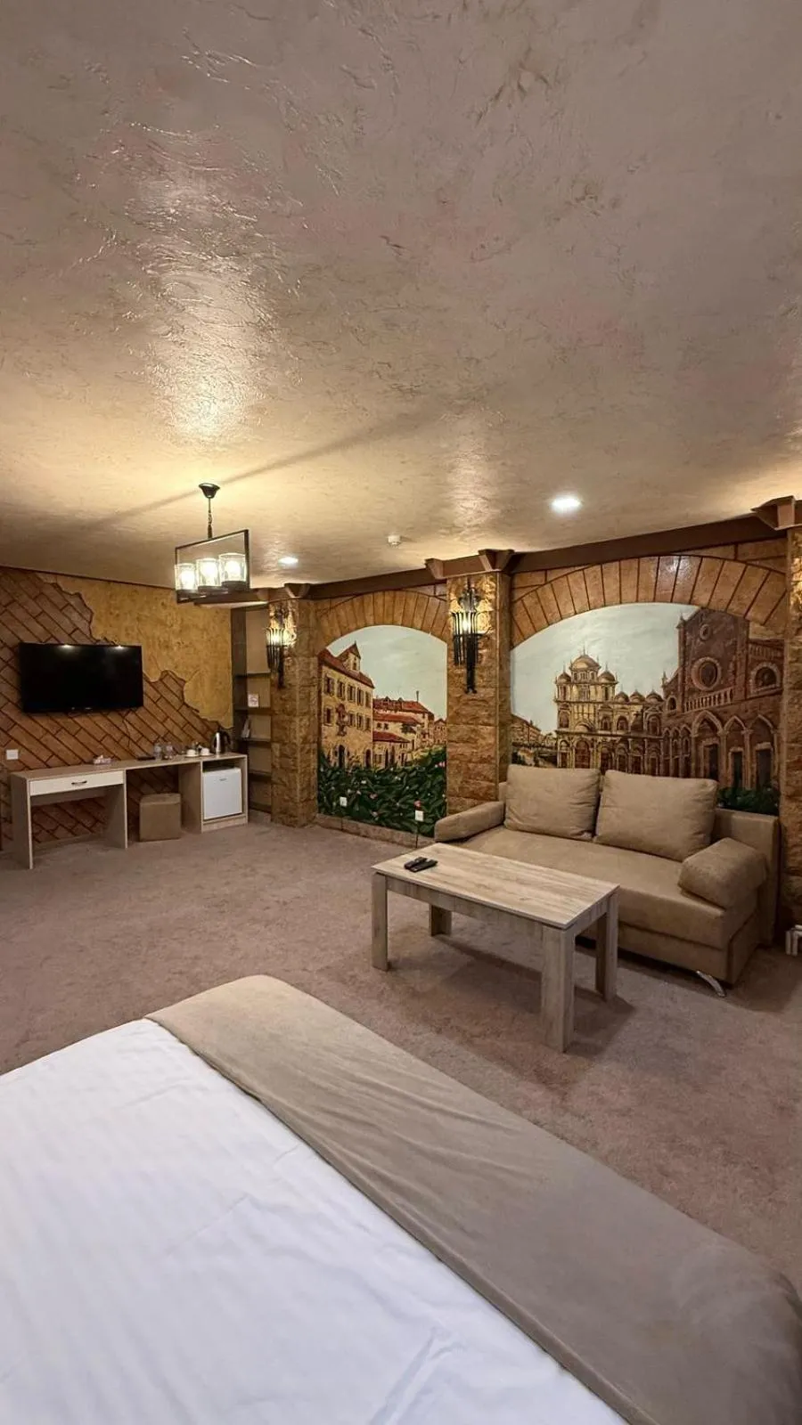 Bed in DeLin Hotel And Tours