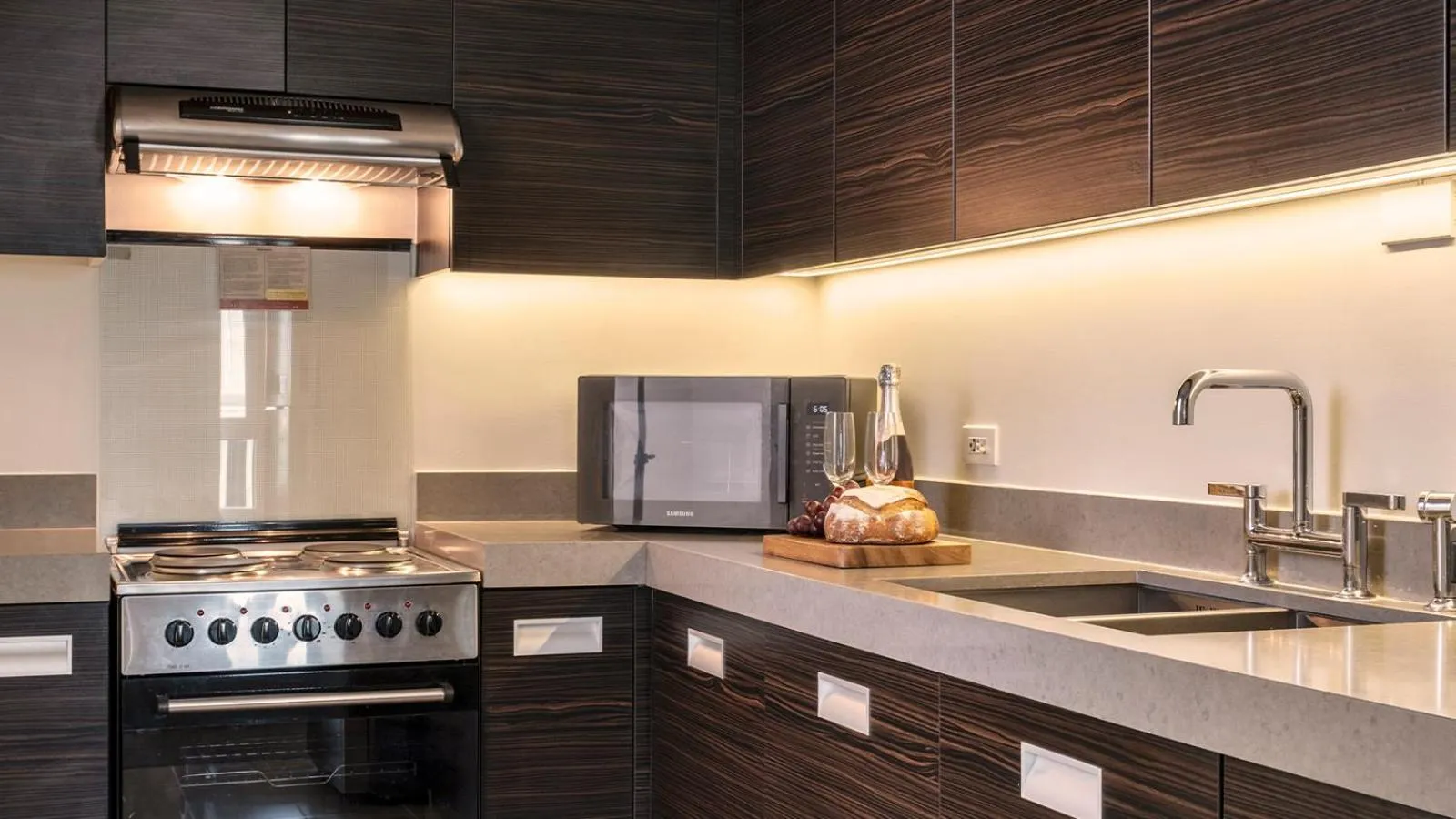 Kitchen or kitchenette in Aruga Apartments by Rockwell Makati