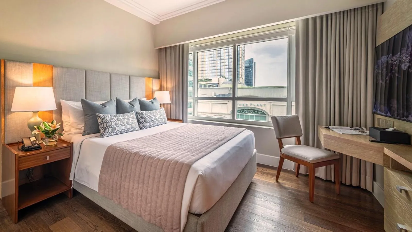 Bed in Aruga Apartments by Rockwell Makati