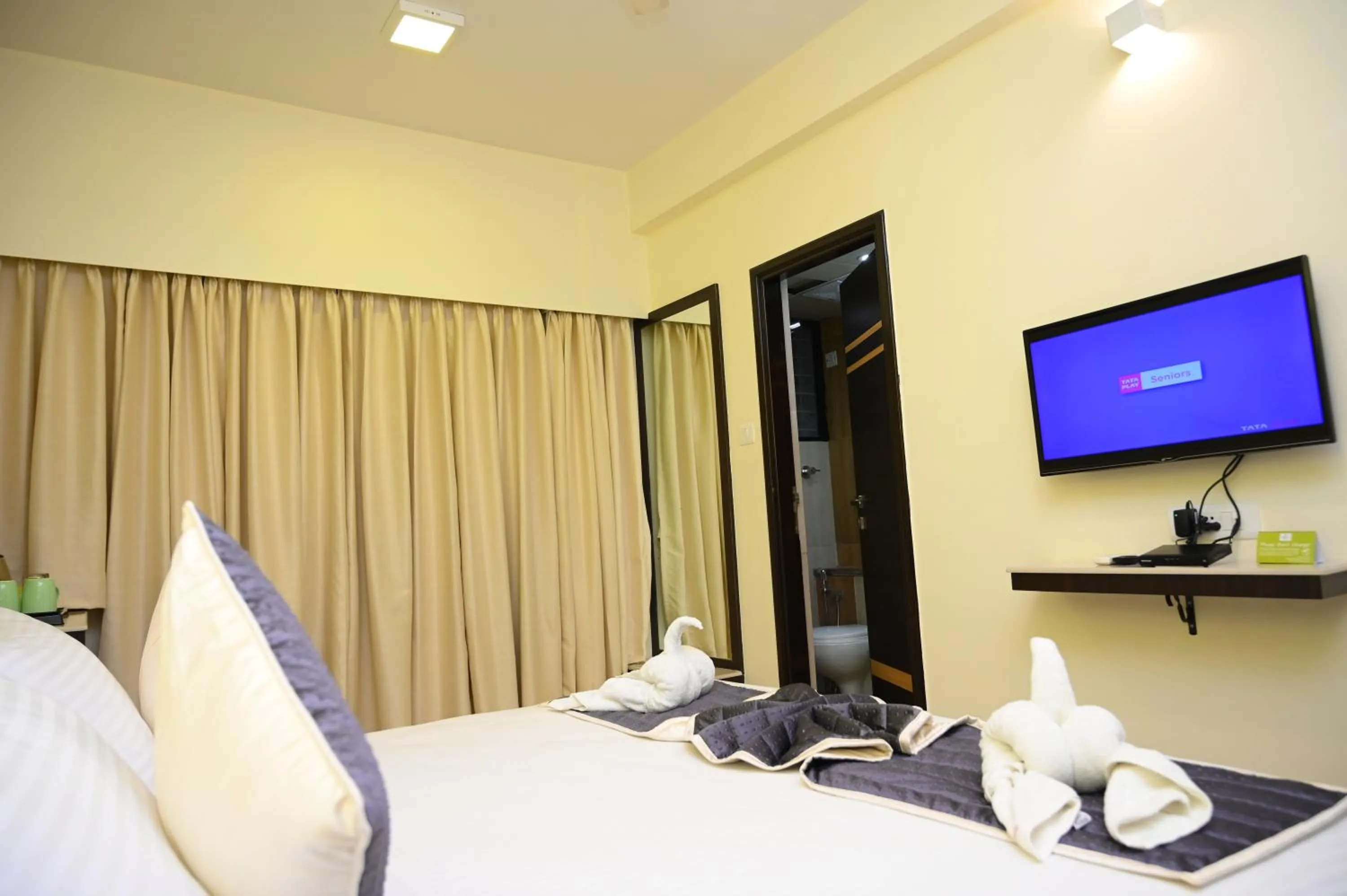 Bedroom, Bed in RAJKIYAM - A Business Hotel