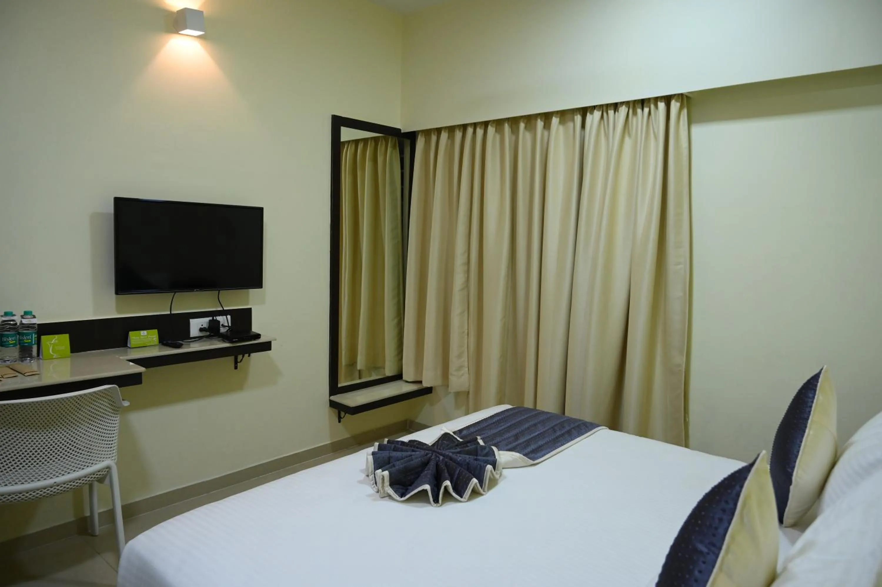 Bed in RAJKIYAM - A Business Hotel