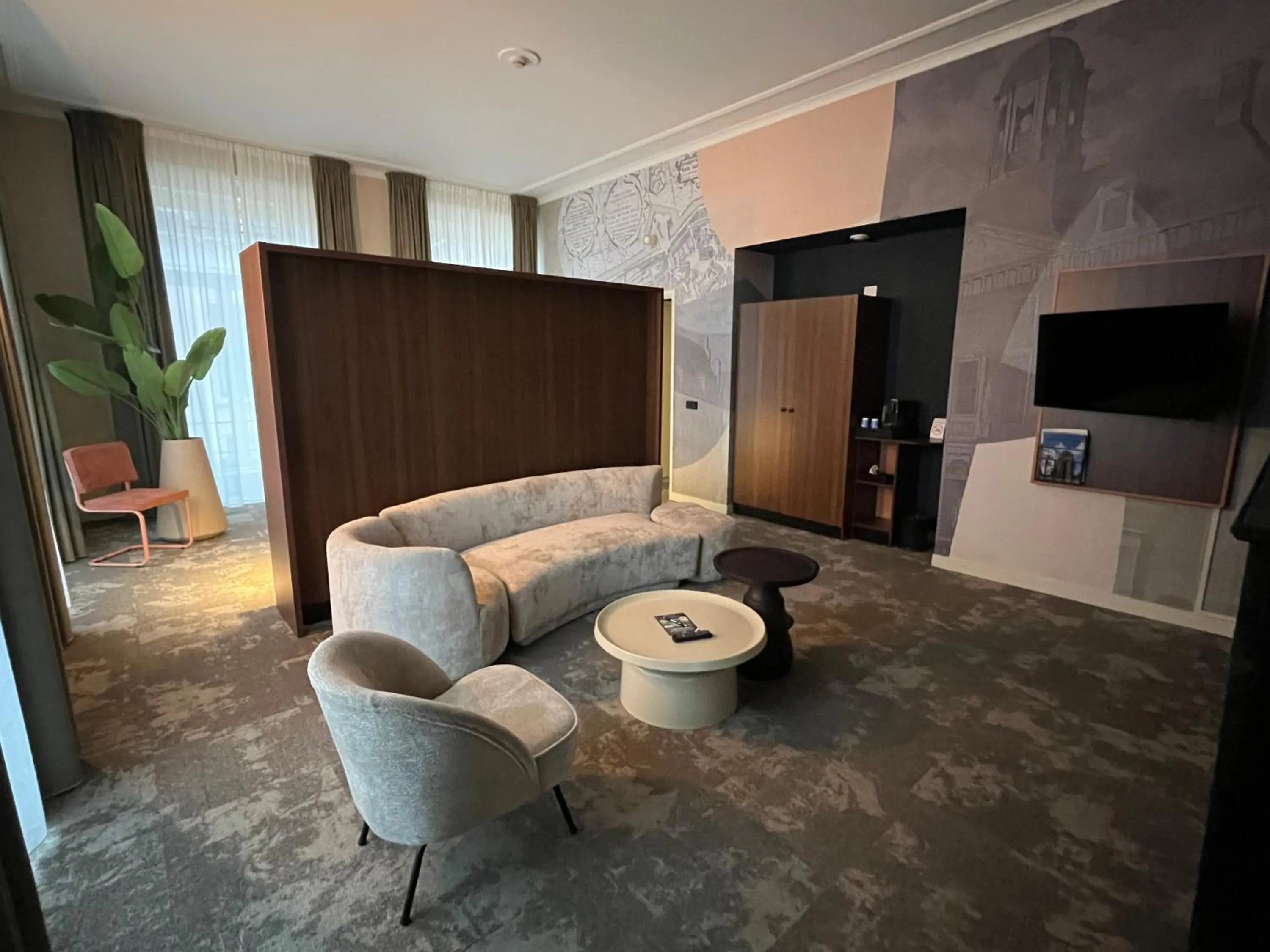 Living room in Fletcher Hotel Paleis Stadhouderlijk Hof