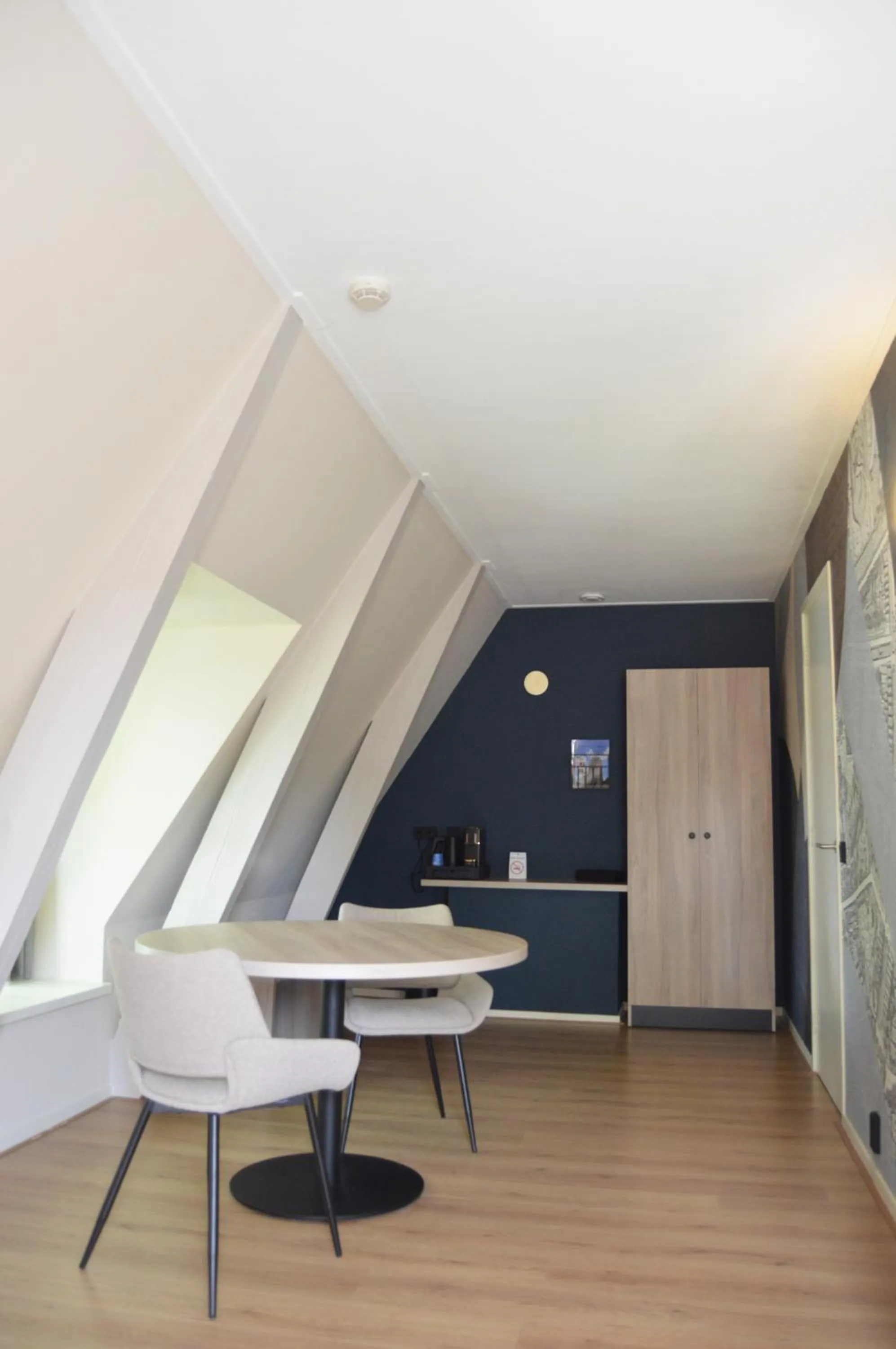 Living room in Fletcher Hotel Paleis Stadhouderlijk Hof