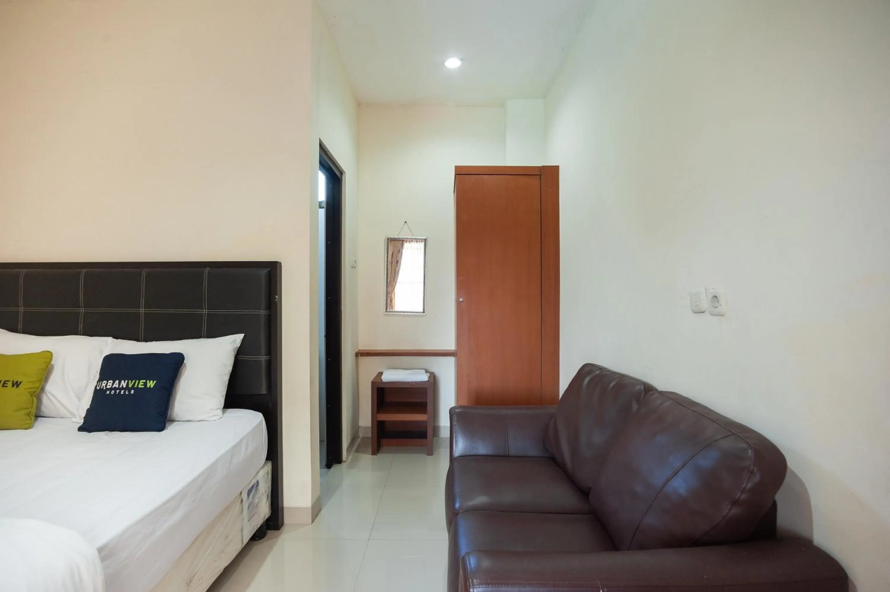 Bed in Urbanview Hotel Syariah Villa SM Cisarua Puncak by RedDoorz