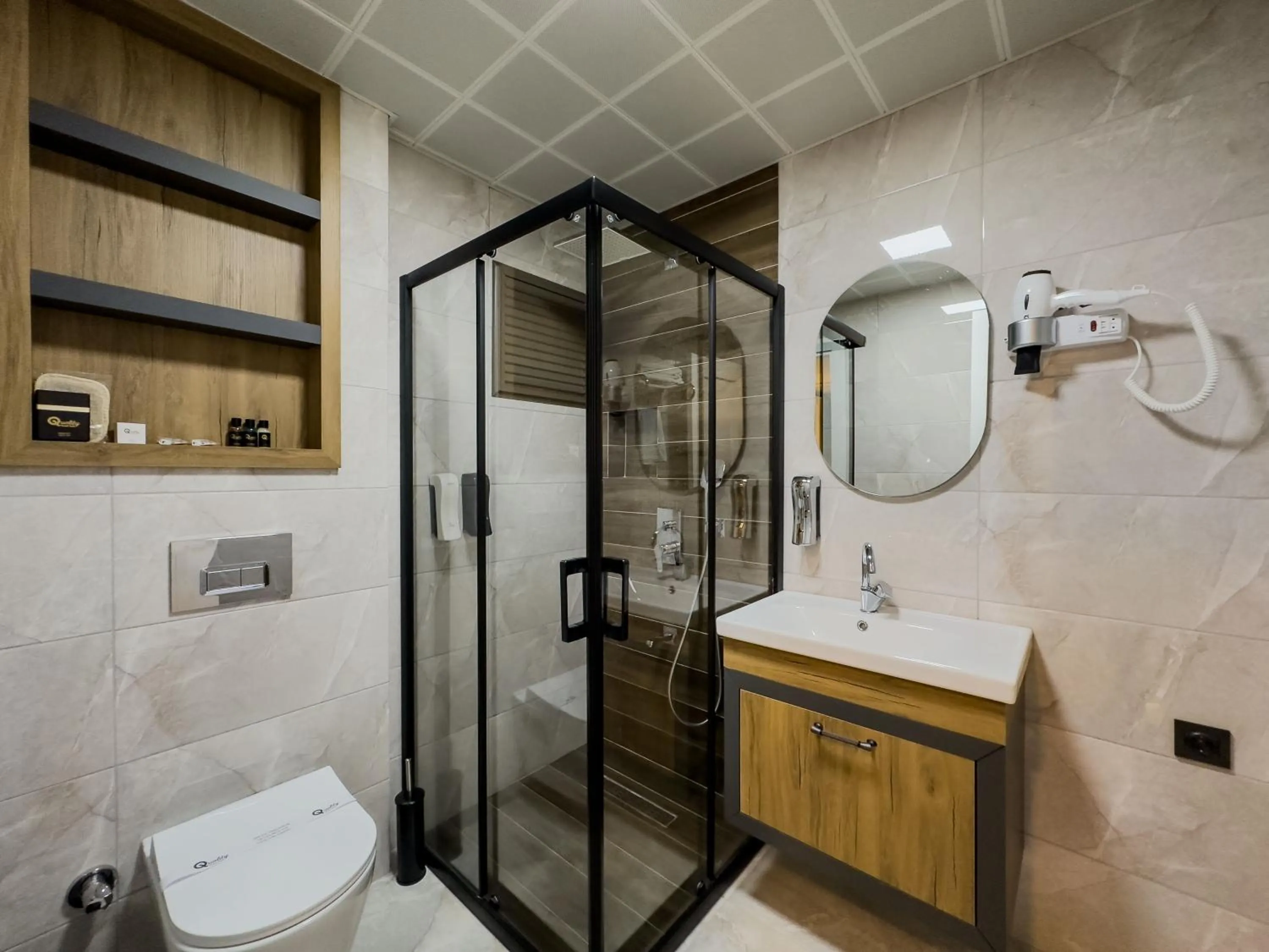 Bathroom in Quality Gold Suite Hotel