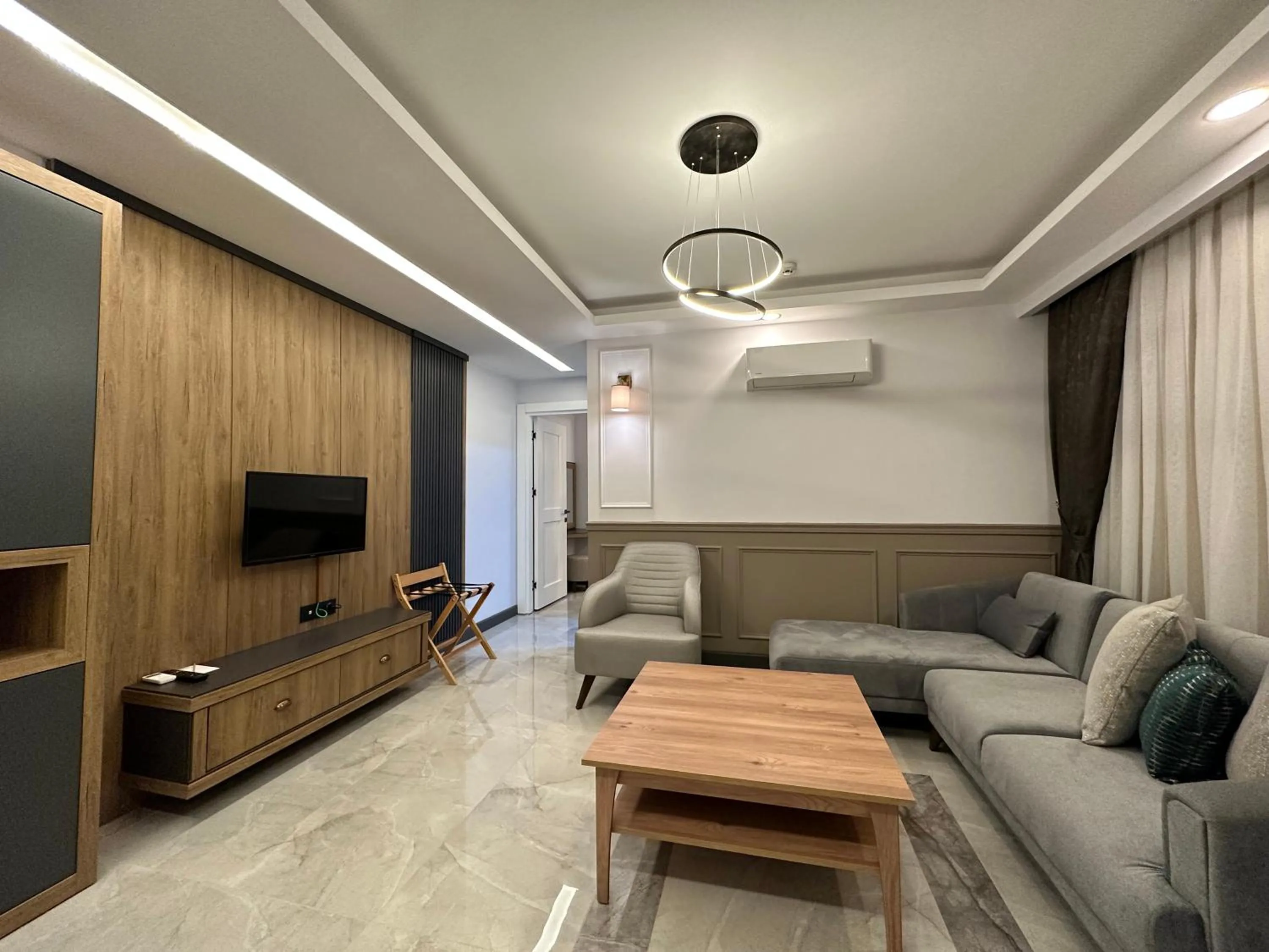 Living room in Quality Gold Suite Hotel