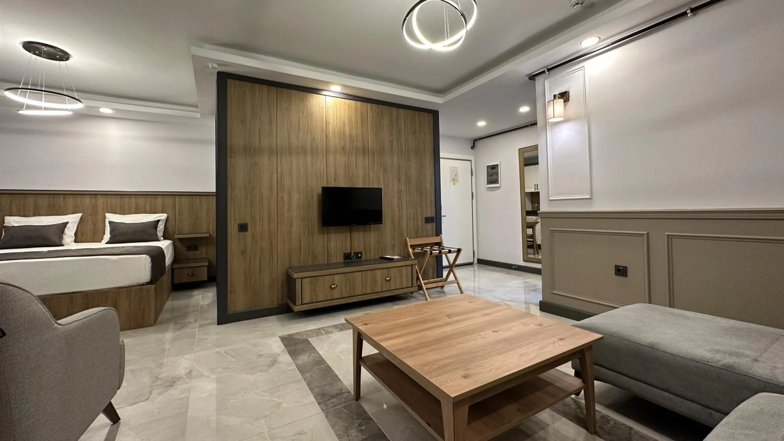 Bed in Quality Gold Suite Hotel