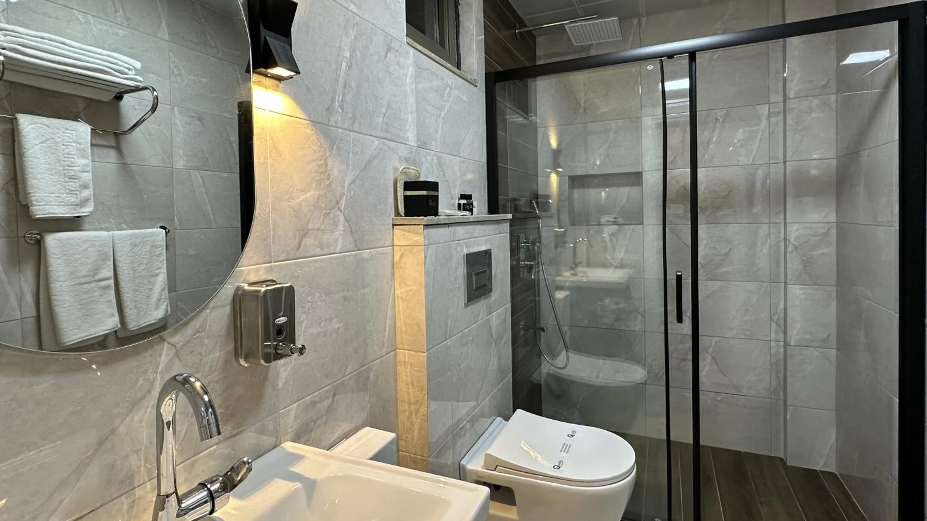 Shower in Quality Gold Suite Hotel