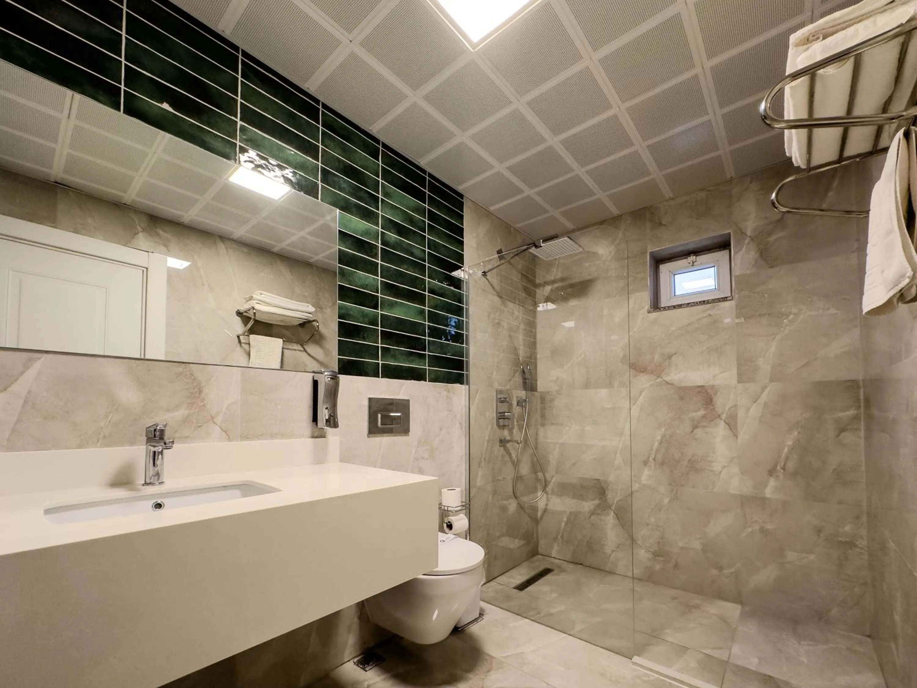 Shower in Quality Gold Suite Hotel