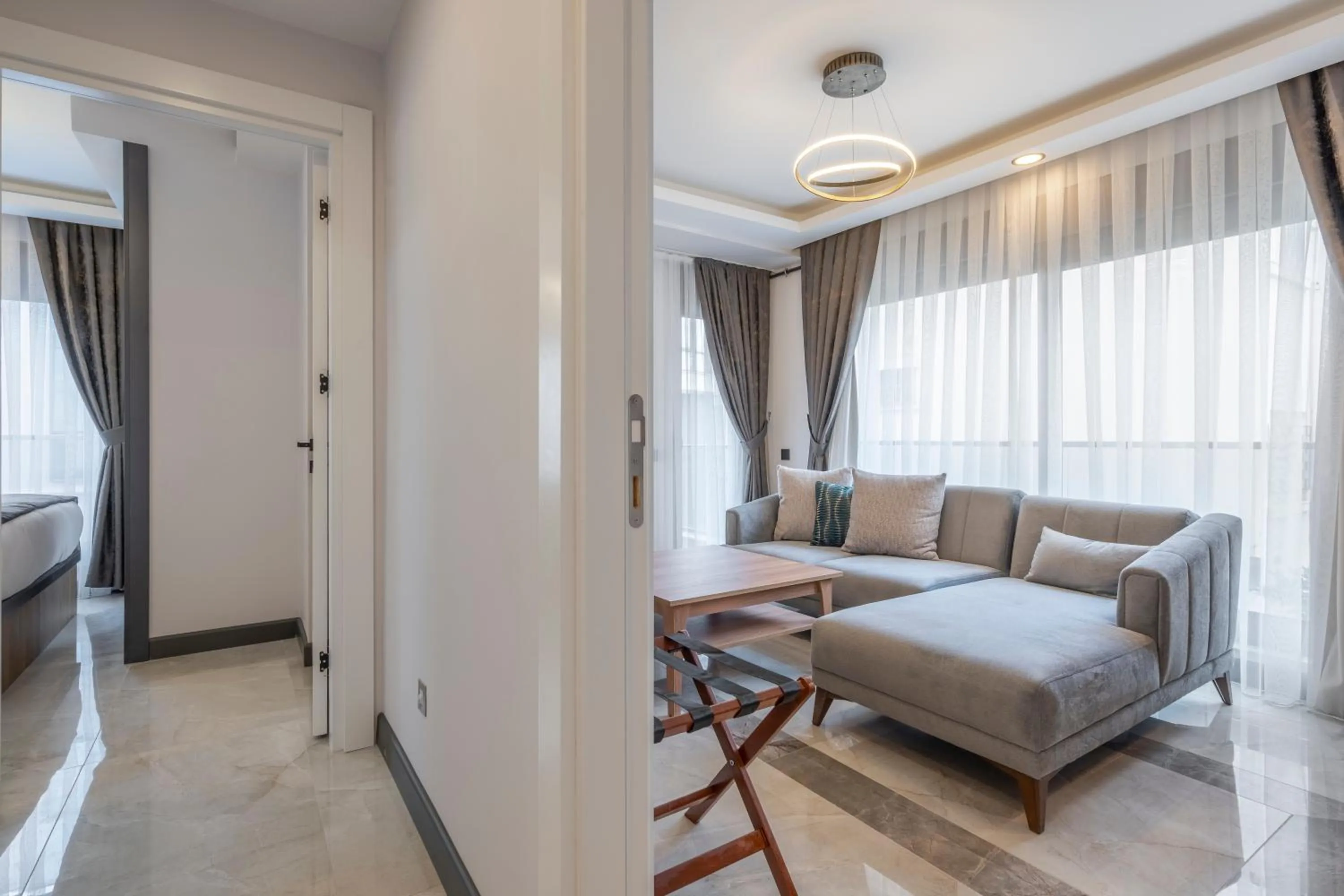 Living room, Bed in Quality Gold Suite Hotel