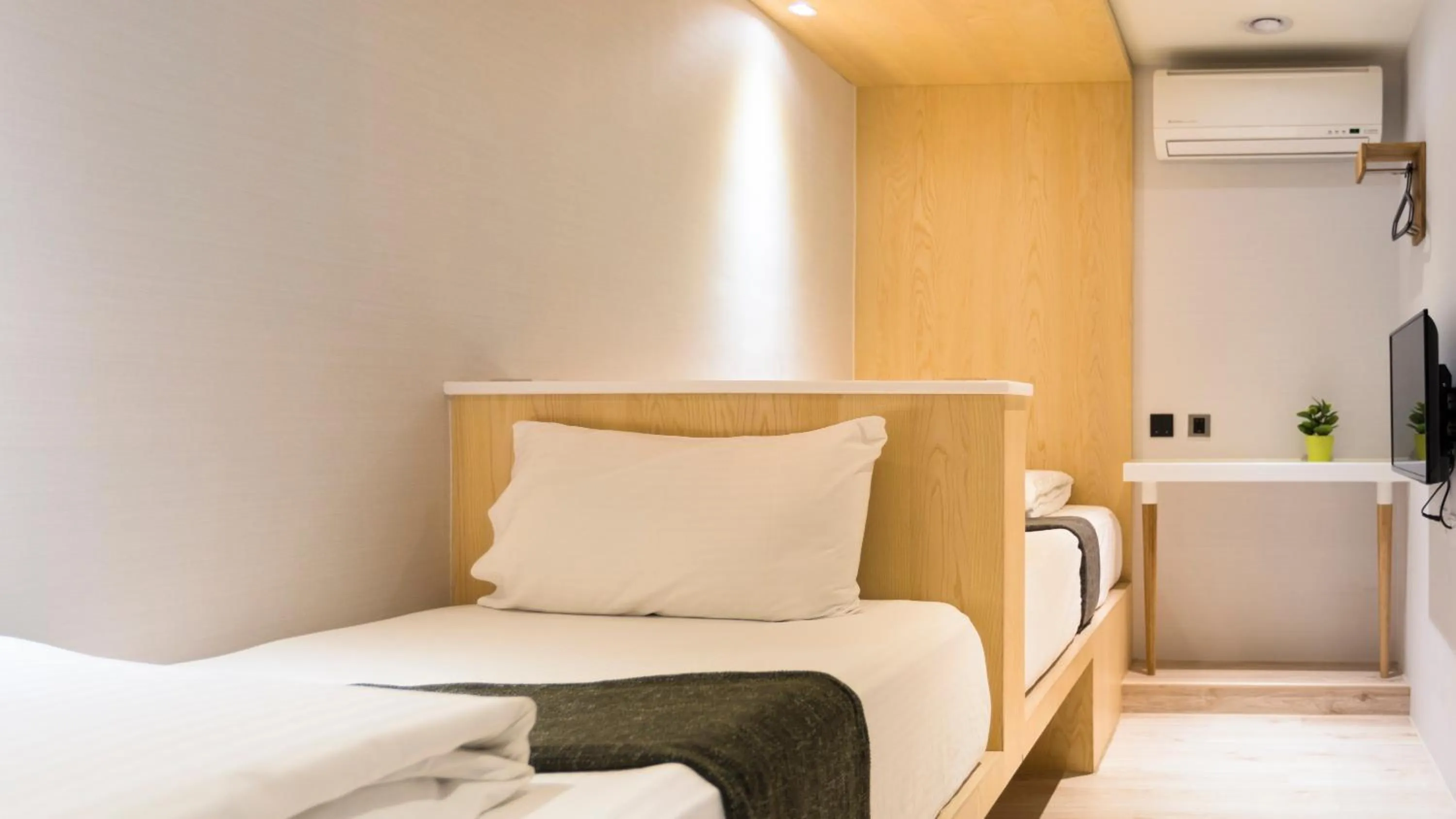 Bed in MEANDER Taipei