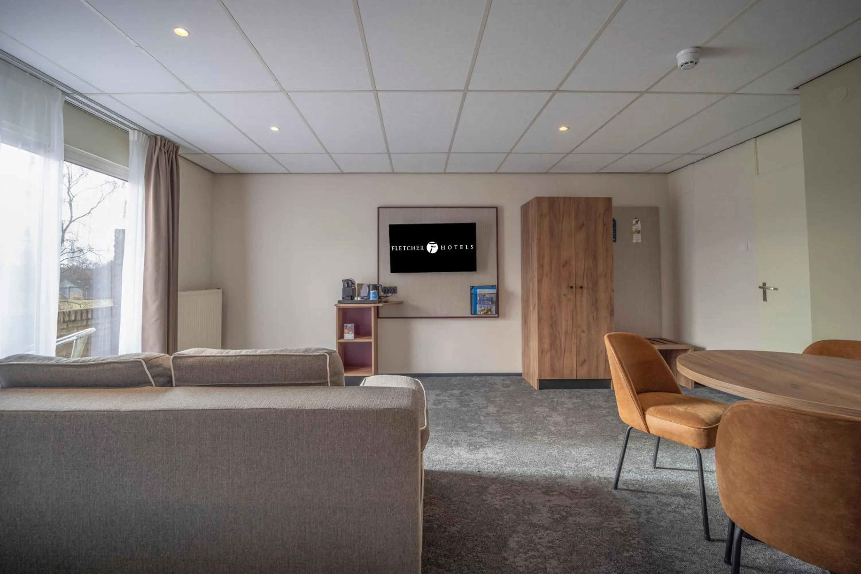 Living room in Fletcher Hotel - Restaurant de Zeegser Duinen