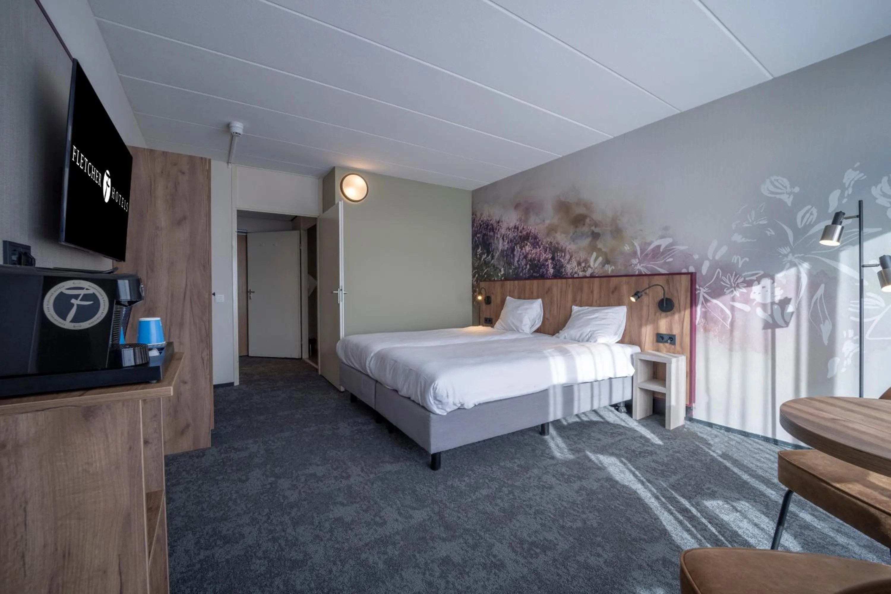 Photo of the whole room, Bed in Fletcher Hotel - Restaurant de Zeegser Duinen