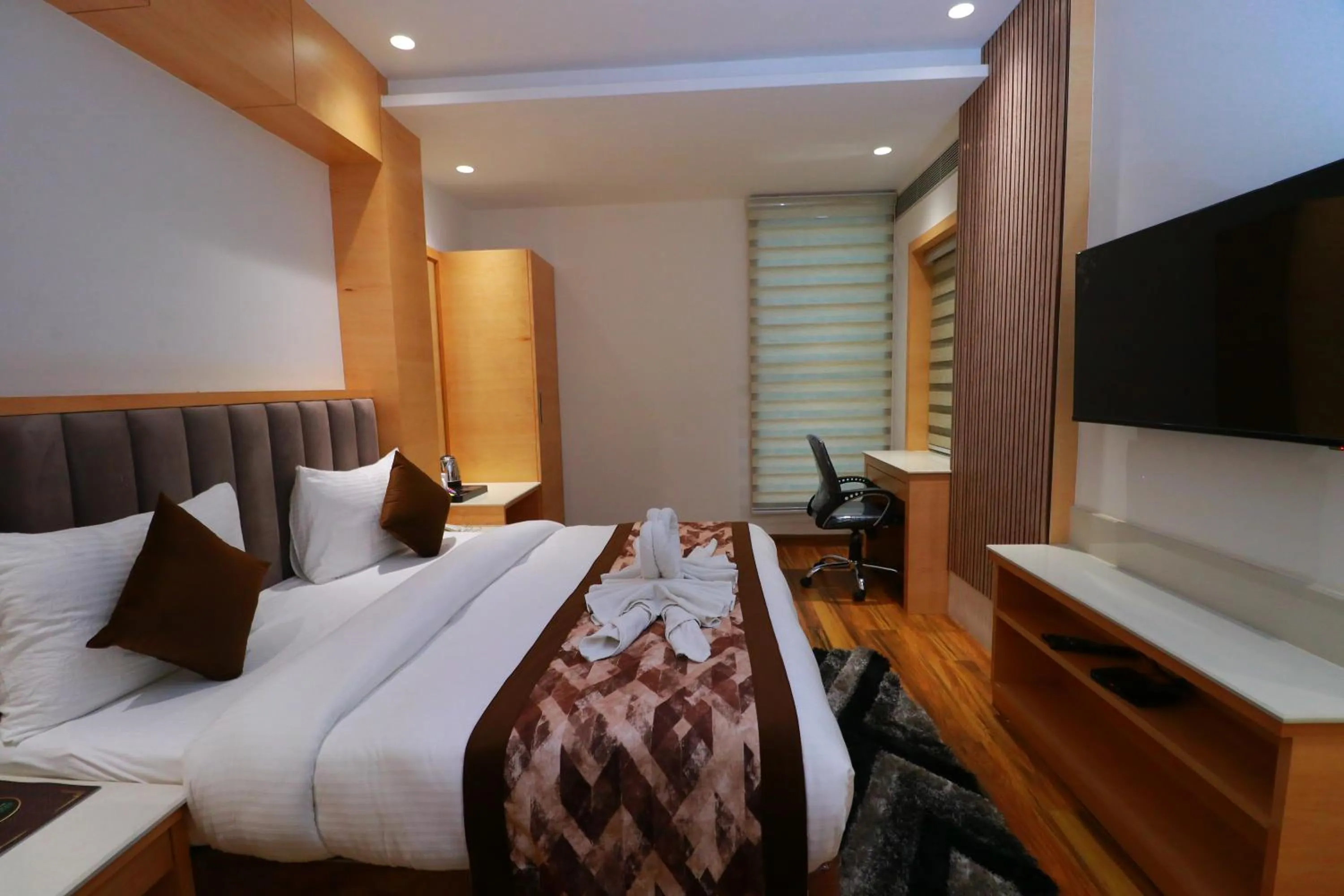 Bedroom in Country Green Hotel & Banquet