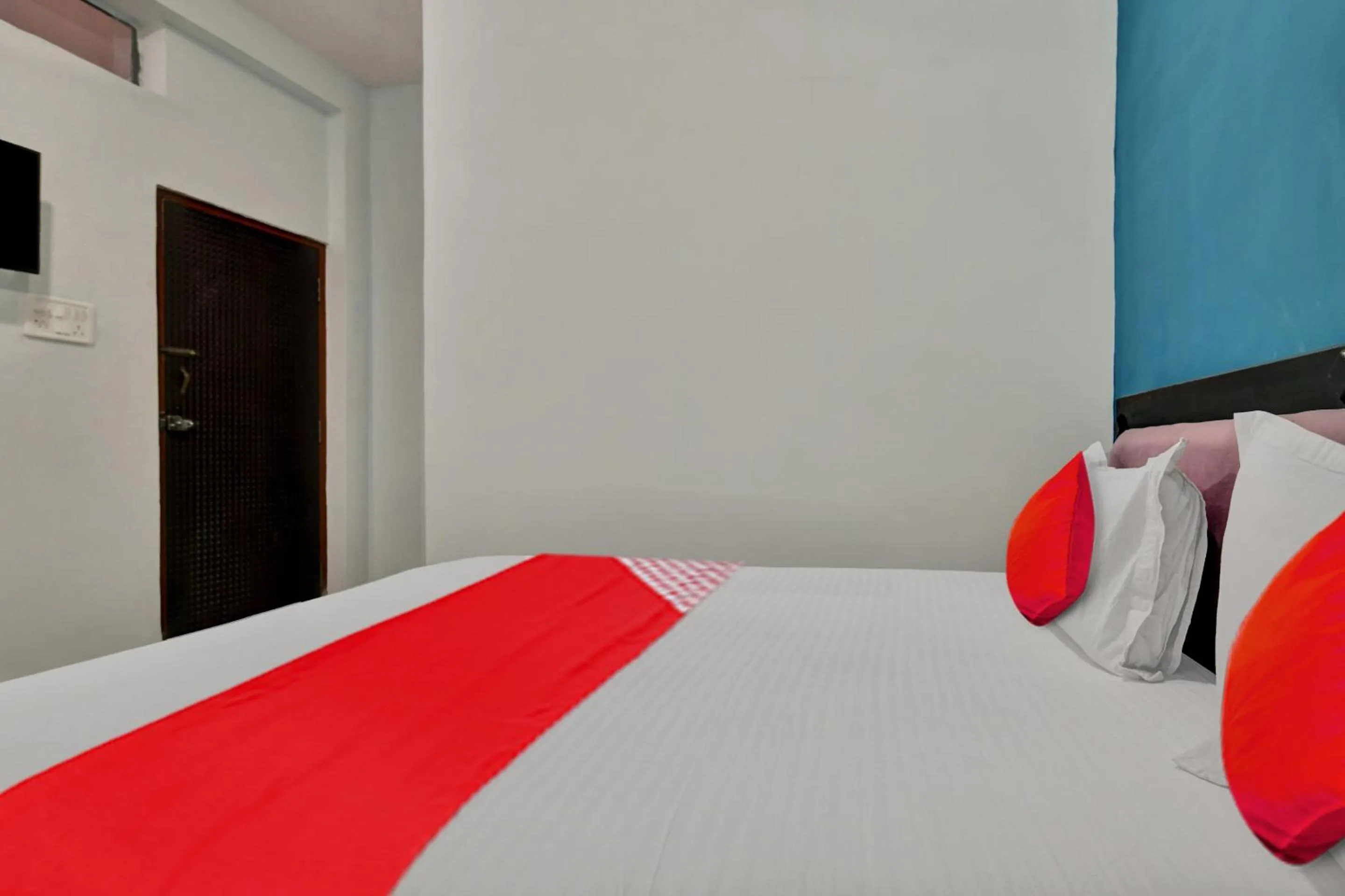 Bedroom in Hotel O Choice Inn