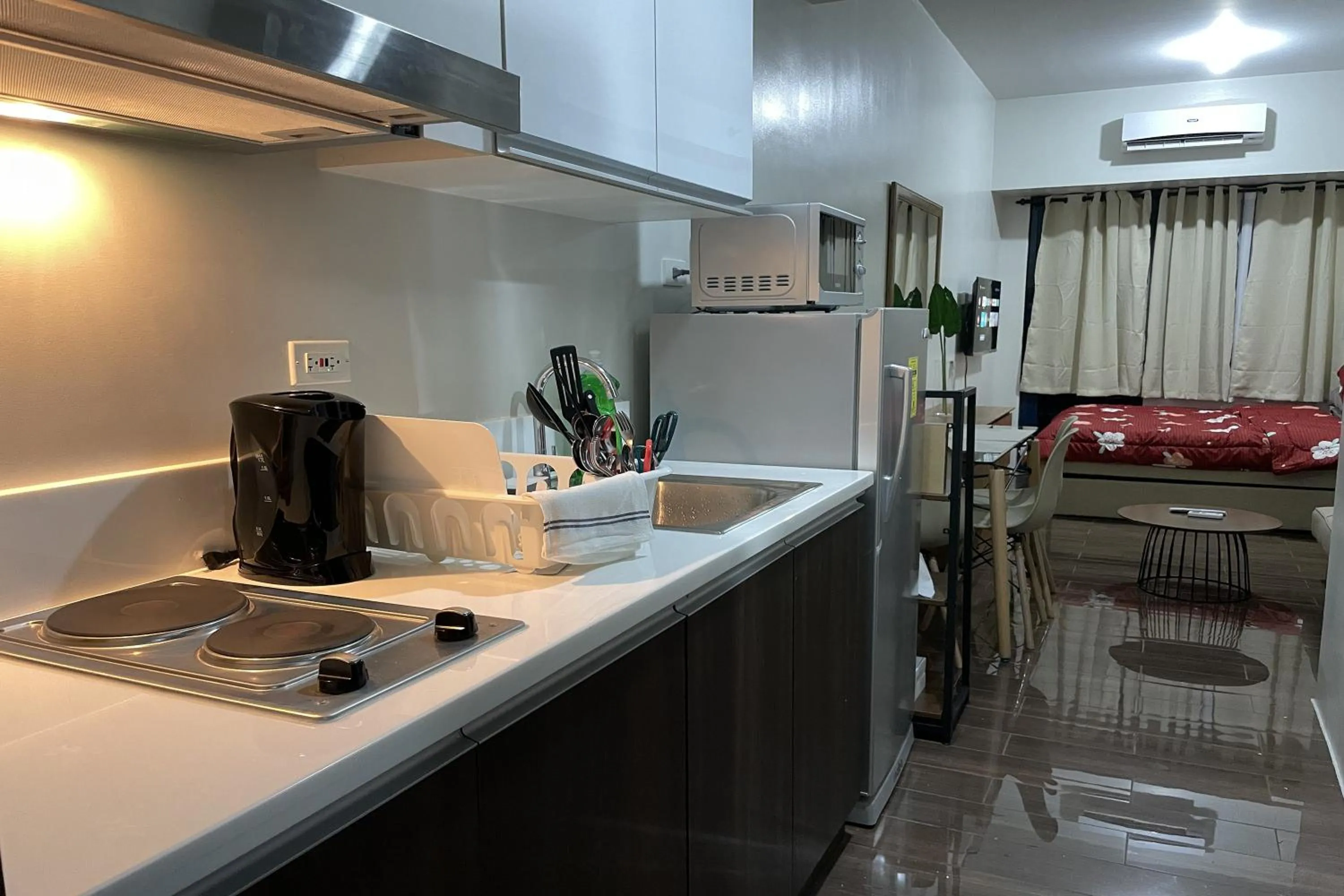 Kitchen or kitchenette, Bed in Luxury Air Residences By Makati