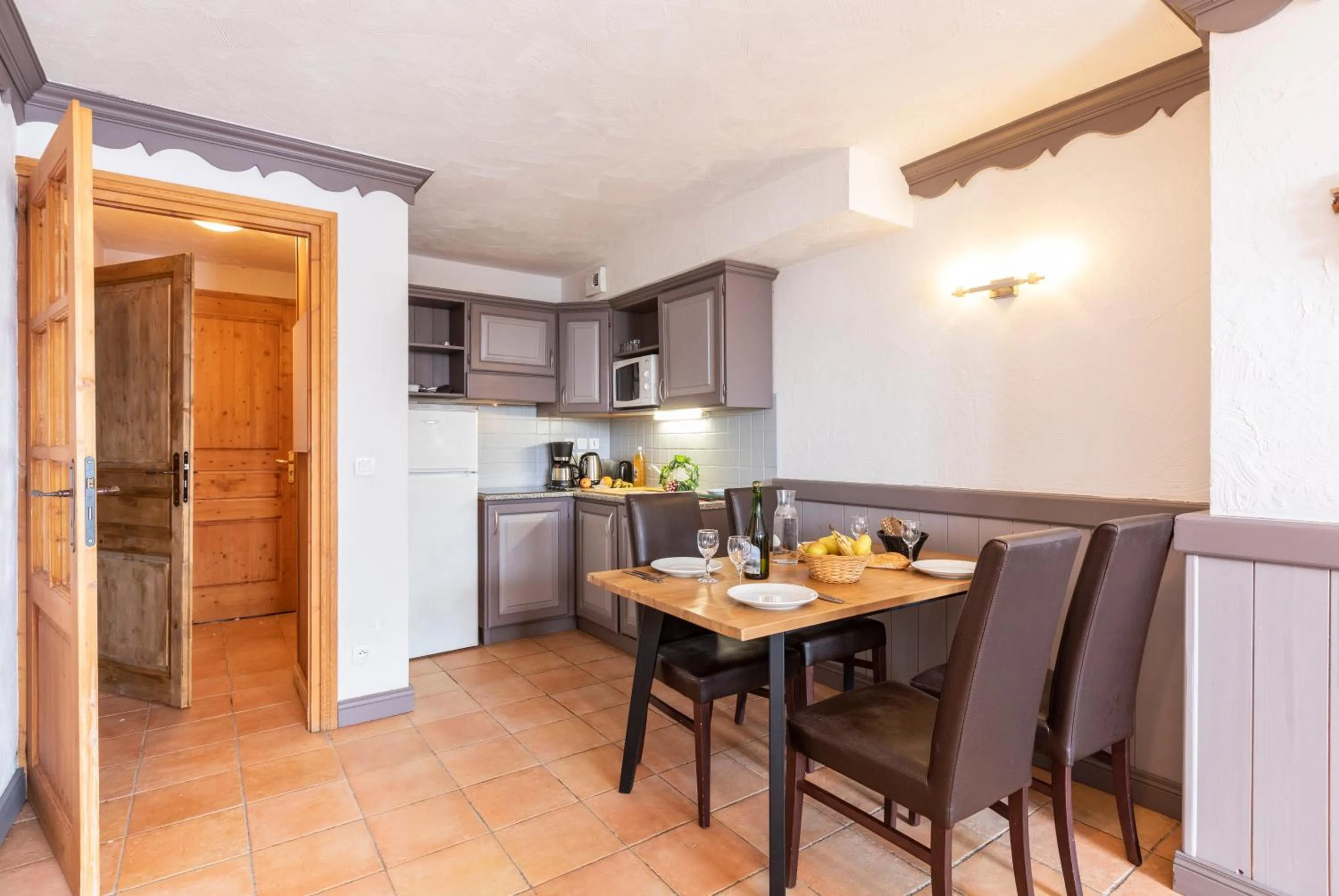 Kitchen or kitchenette in Chalet des Neiges Plein Sud