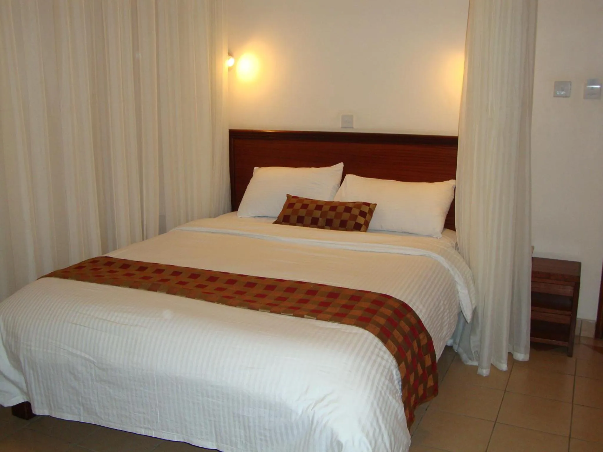 Bed in Hennessis Hotel