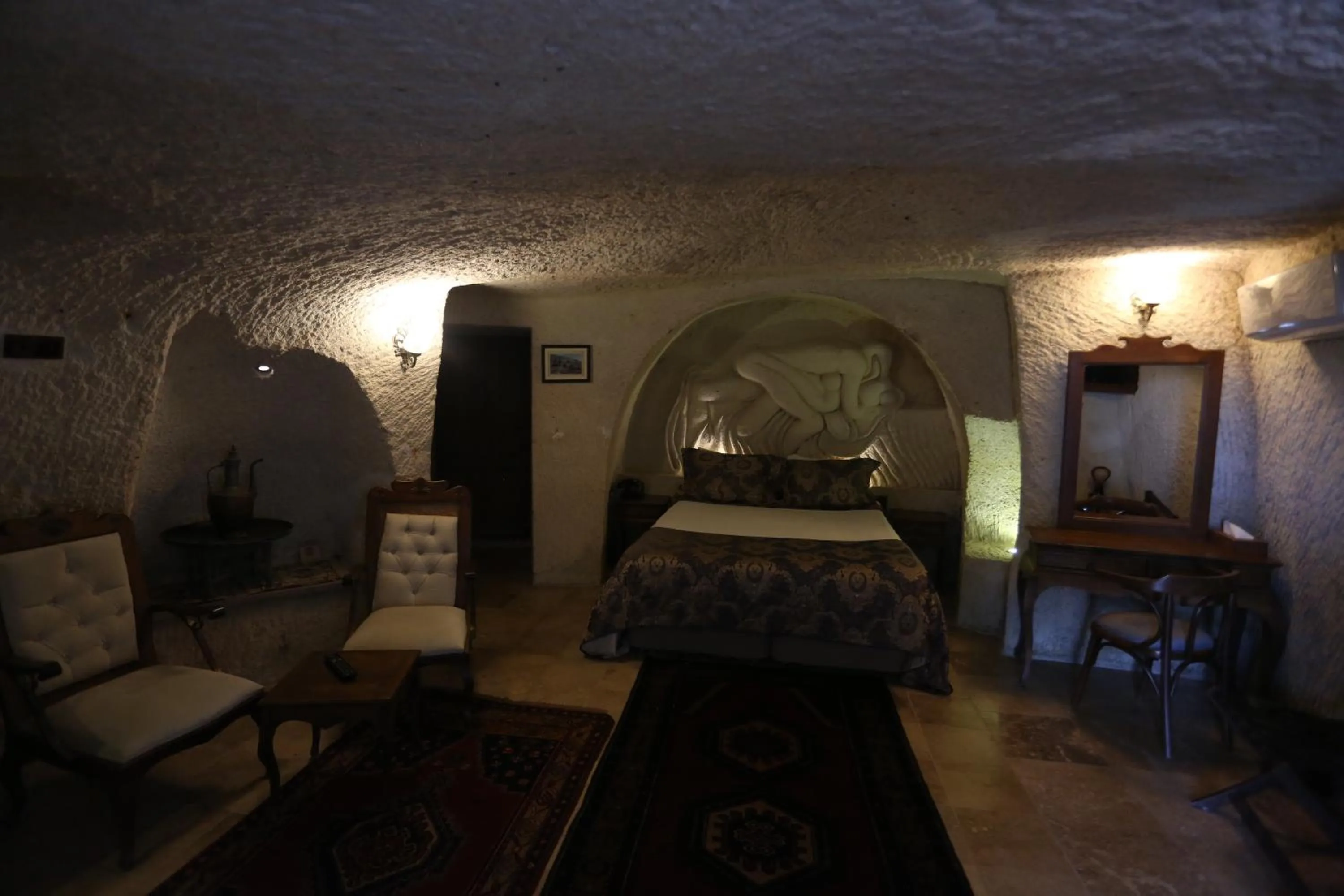 Bed in Phocas Cave Suites